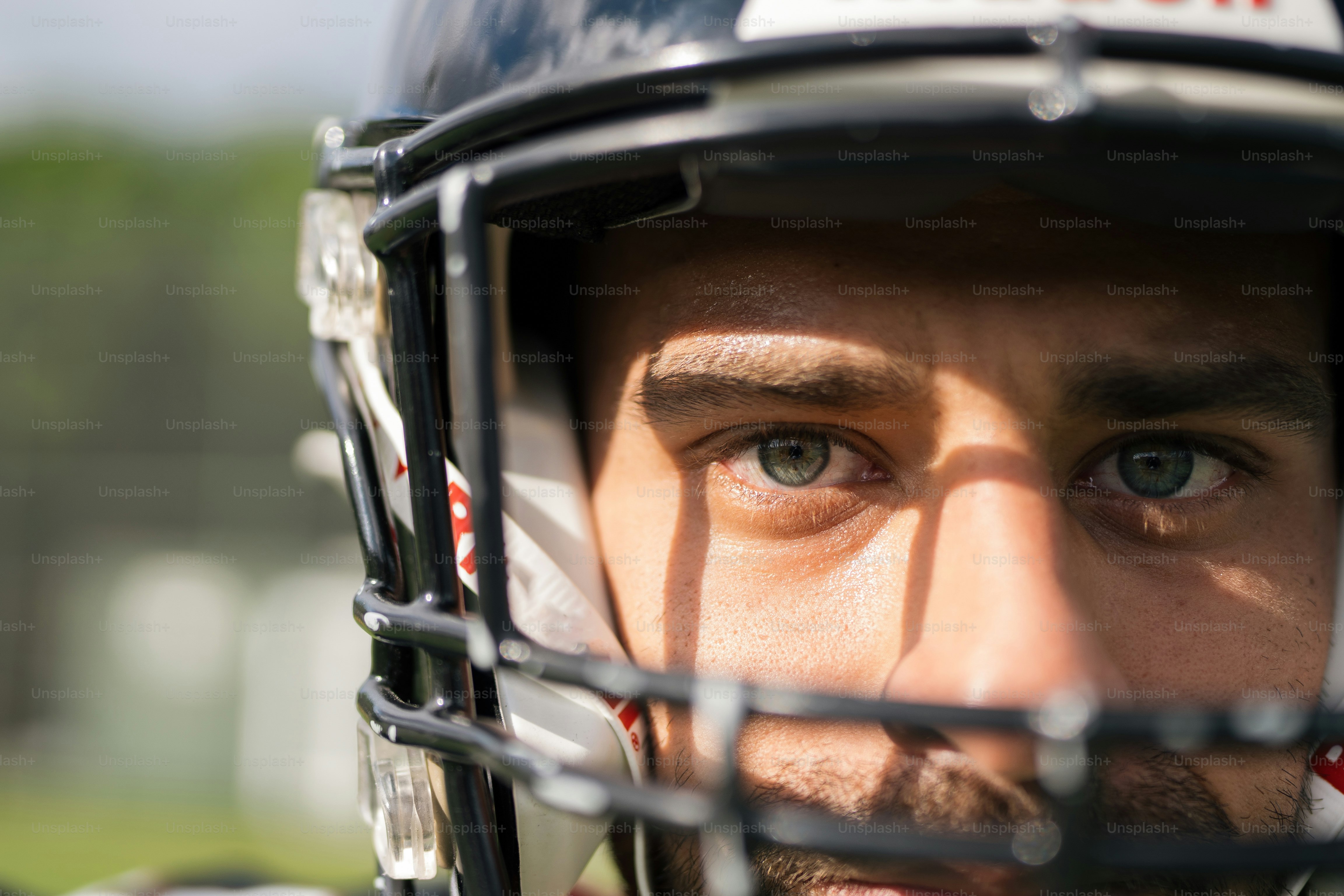 A close up of a football player wearing a helmet