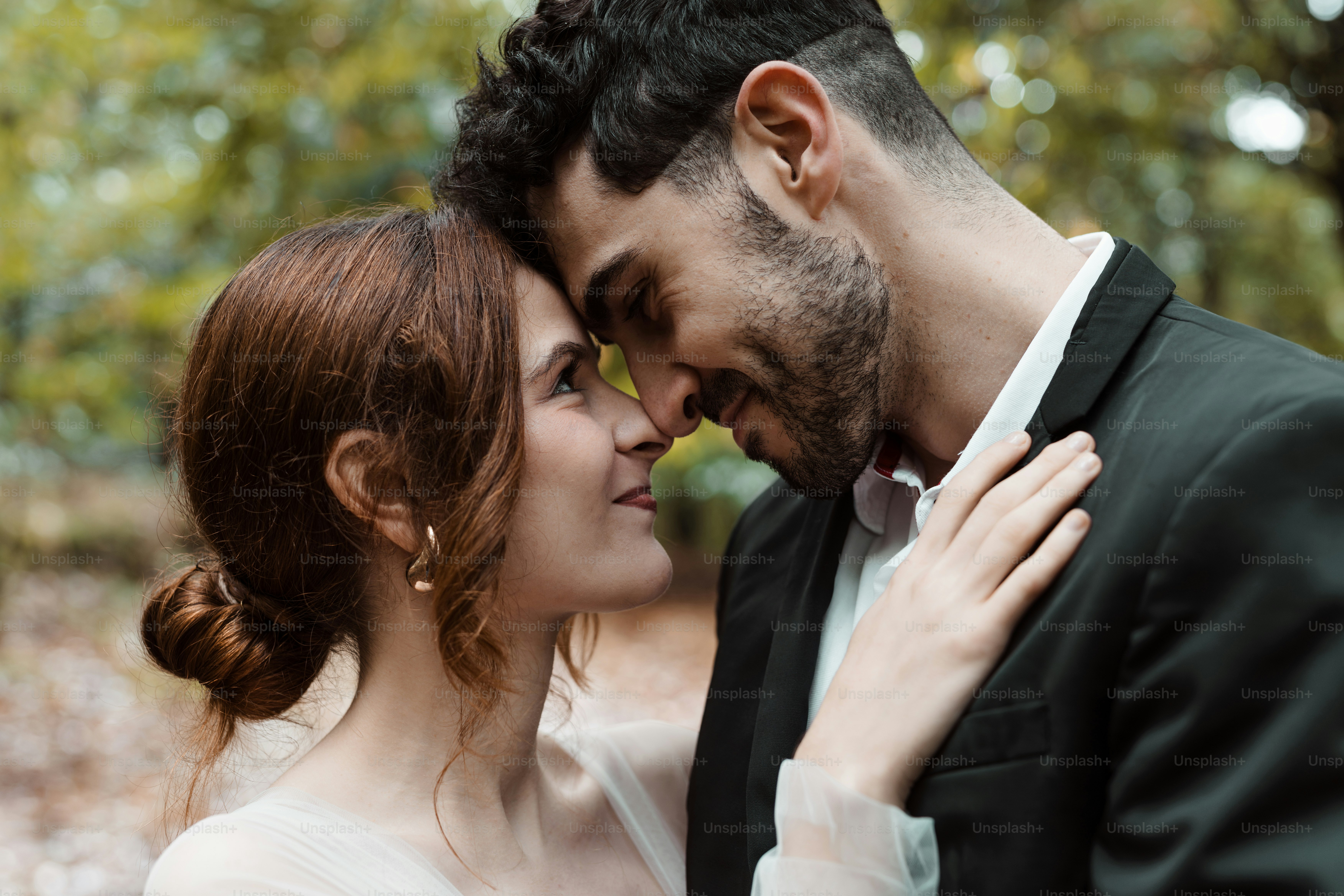 A man and a woman standing next to each other