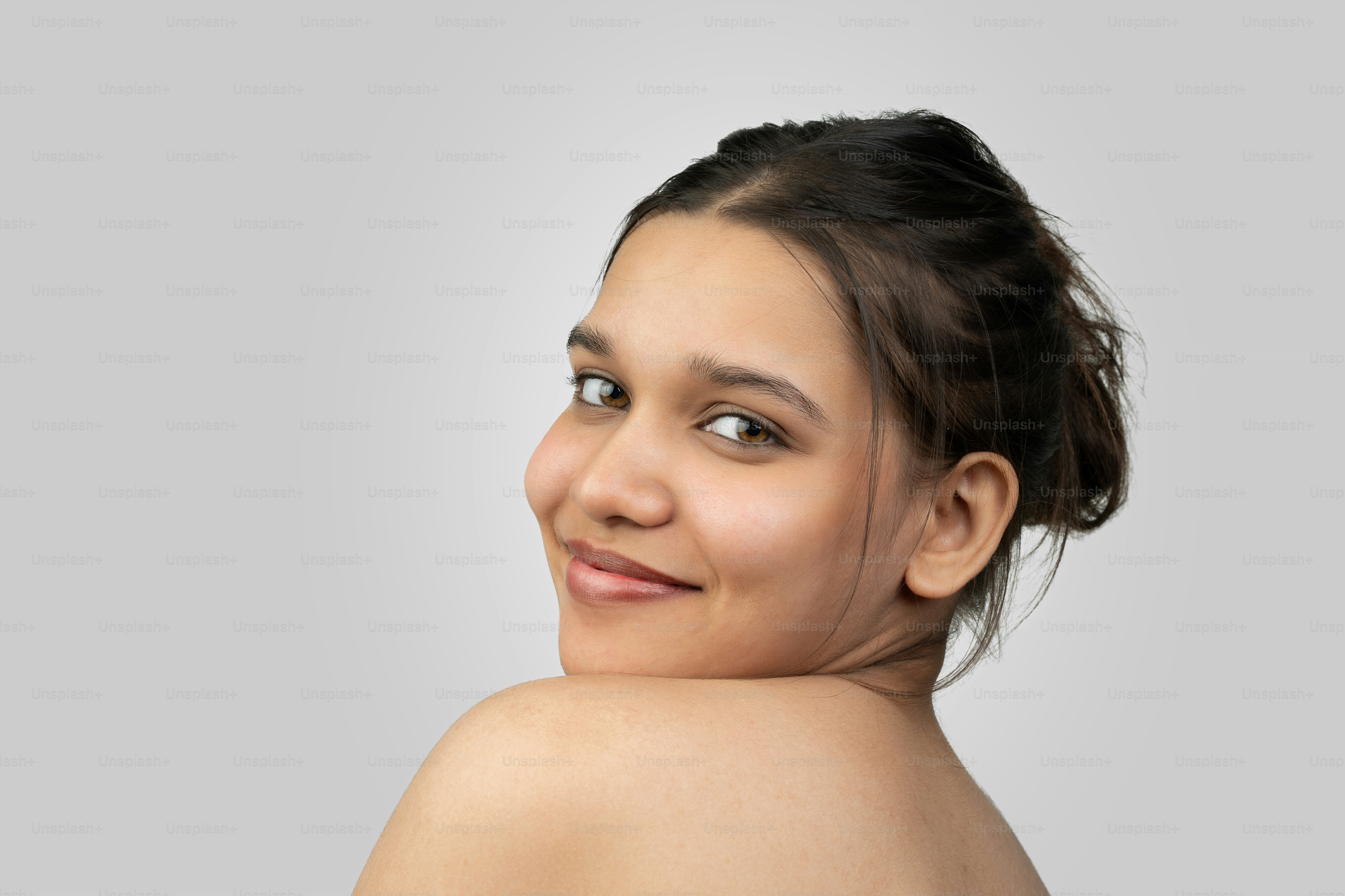 A woman with no shirt on