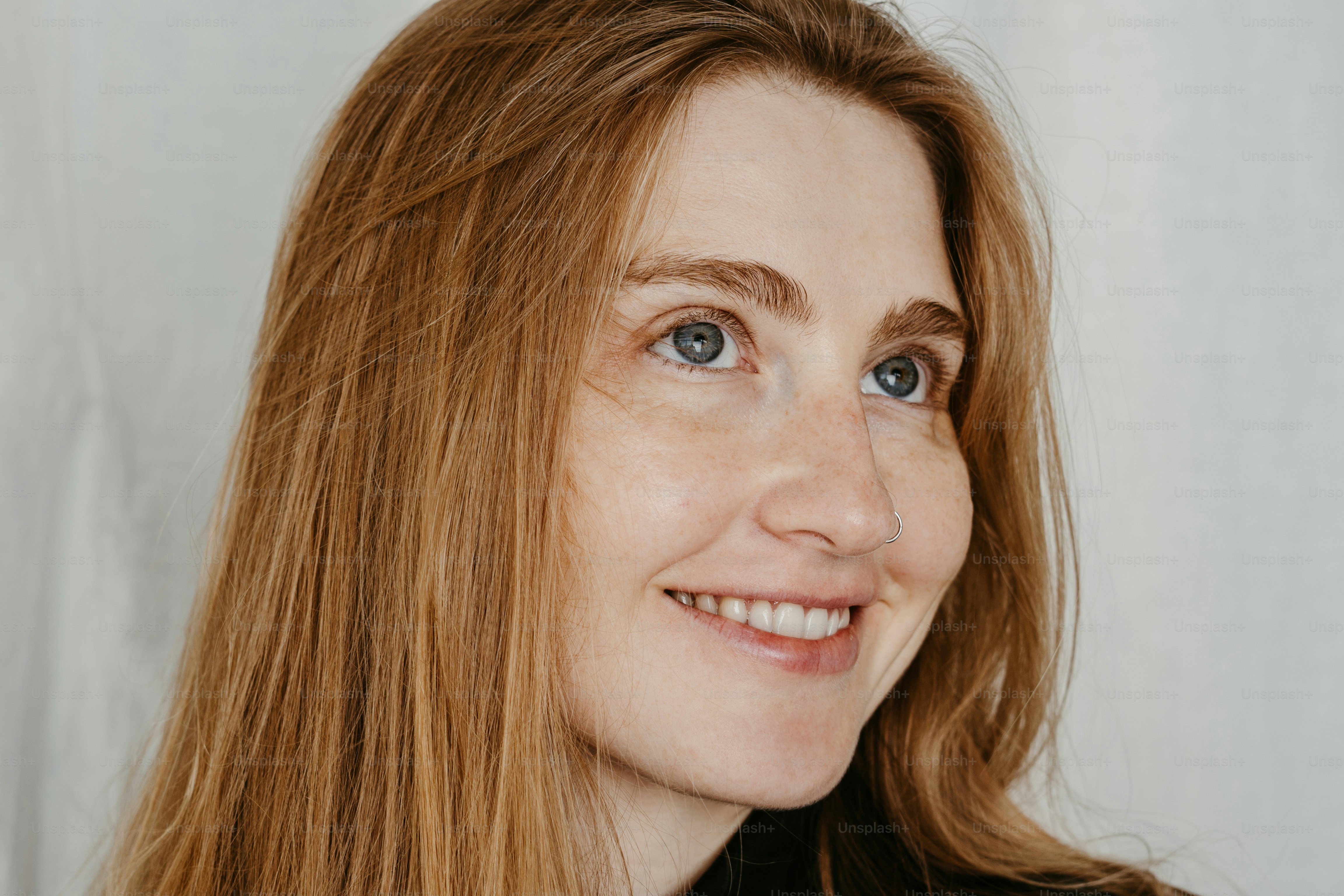A close up of a person with long hair