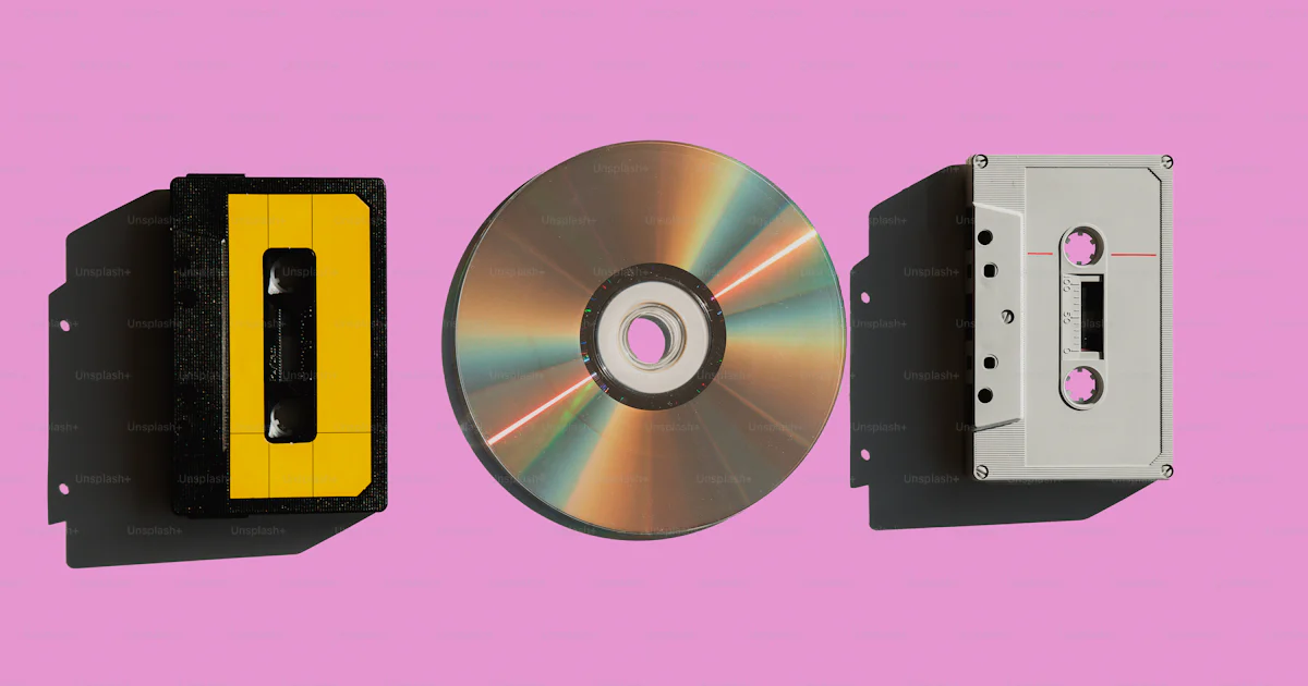 Cd Types Explained A group of different types of cd's on a pink background photo – Old ...