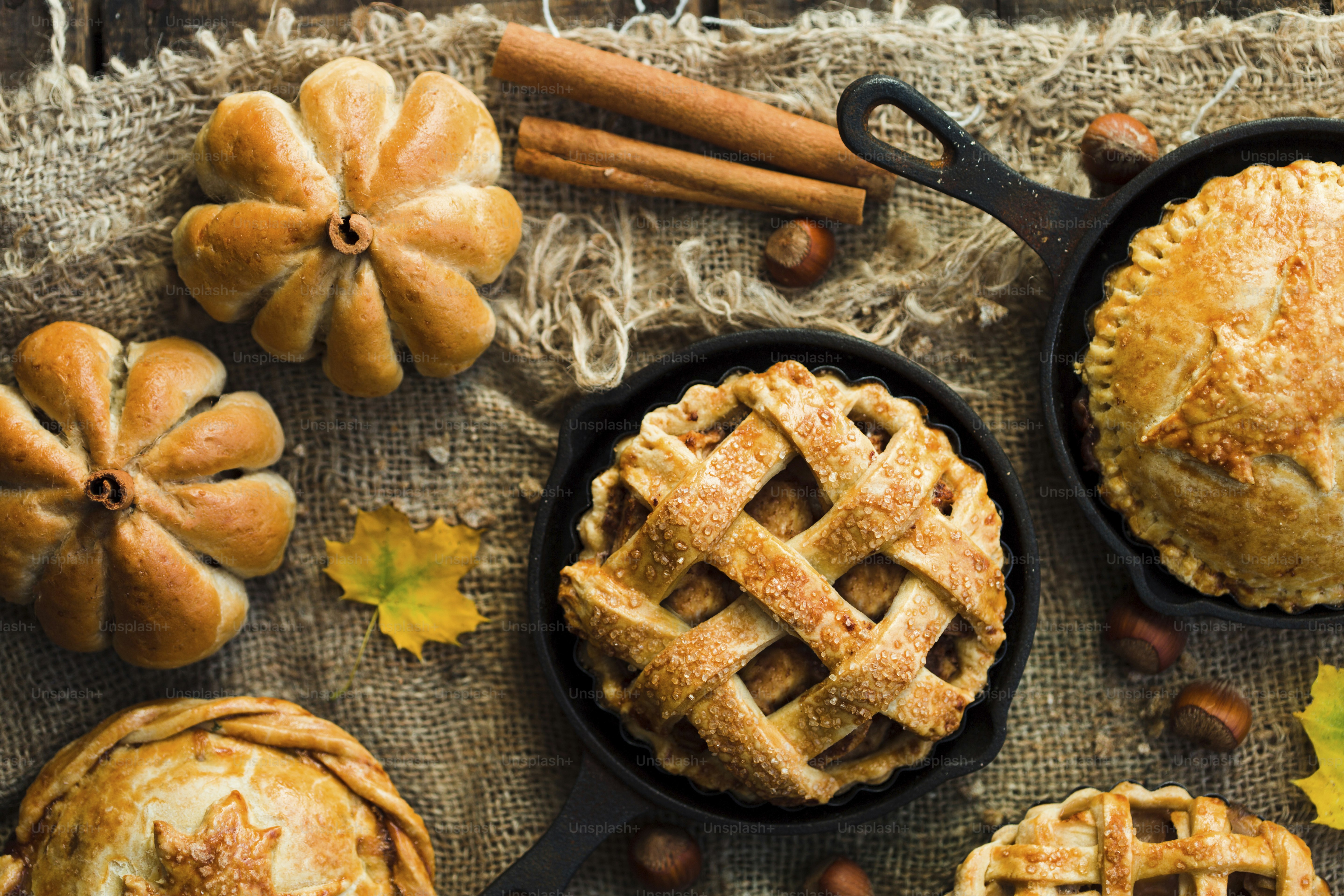 A table topped with pies and other baked goods