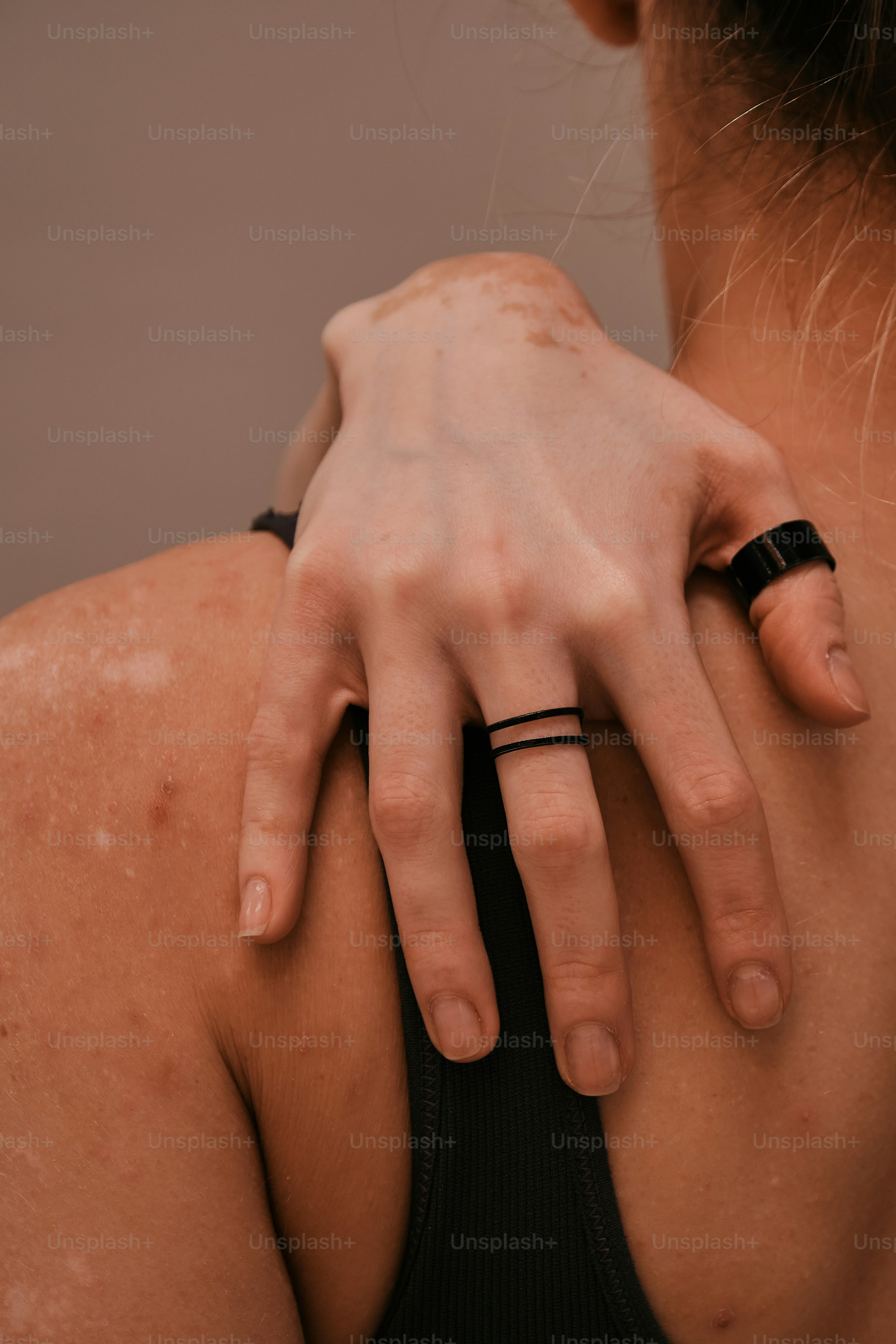 A close up of a person wearing a ring