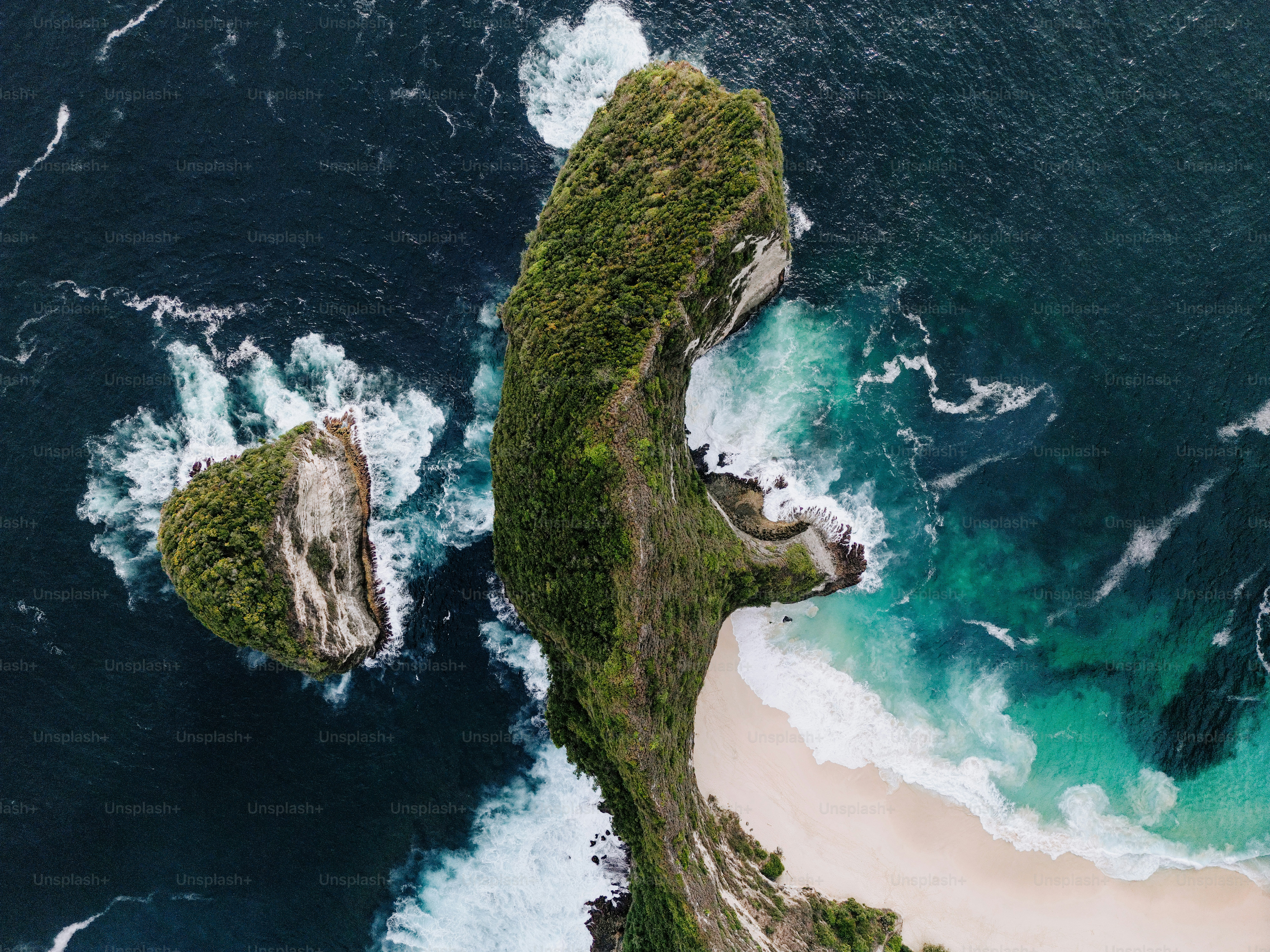 An aerial view of a beach and a body of water