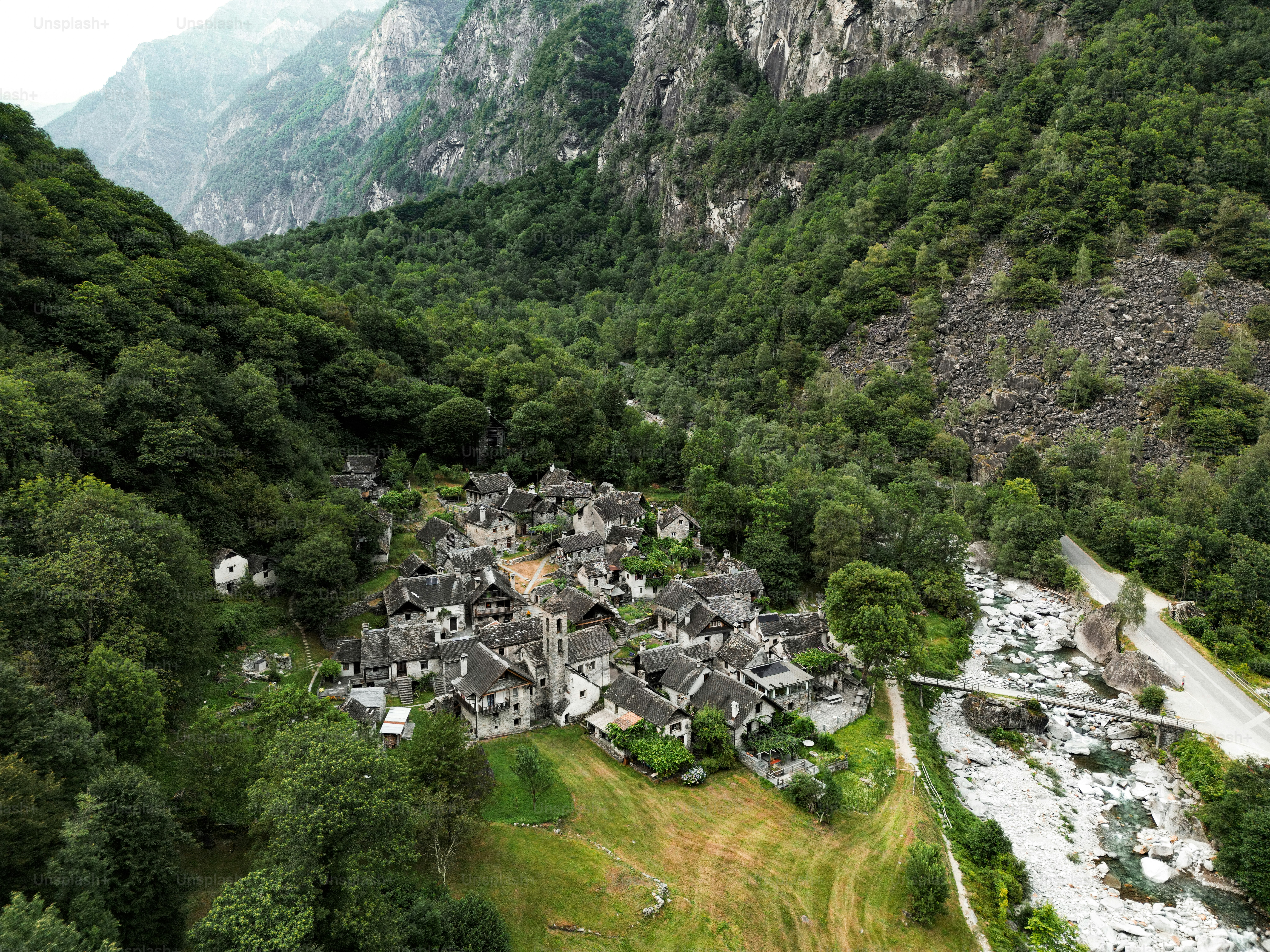 An aerial view of a village in the mountains