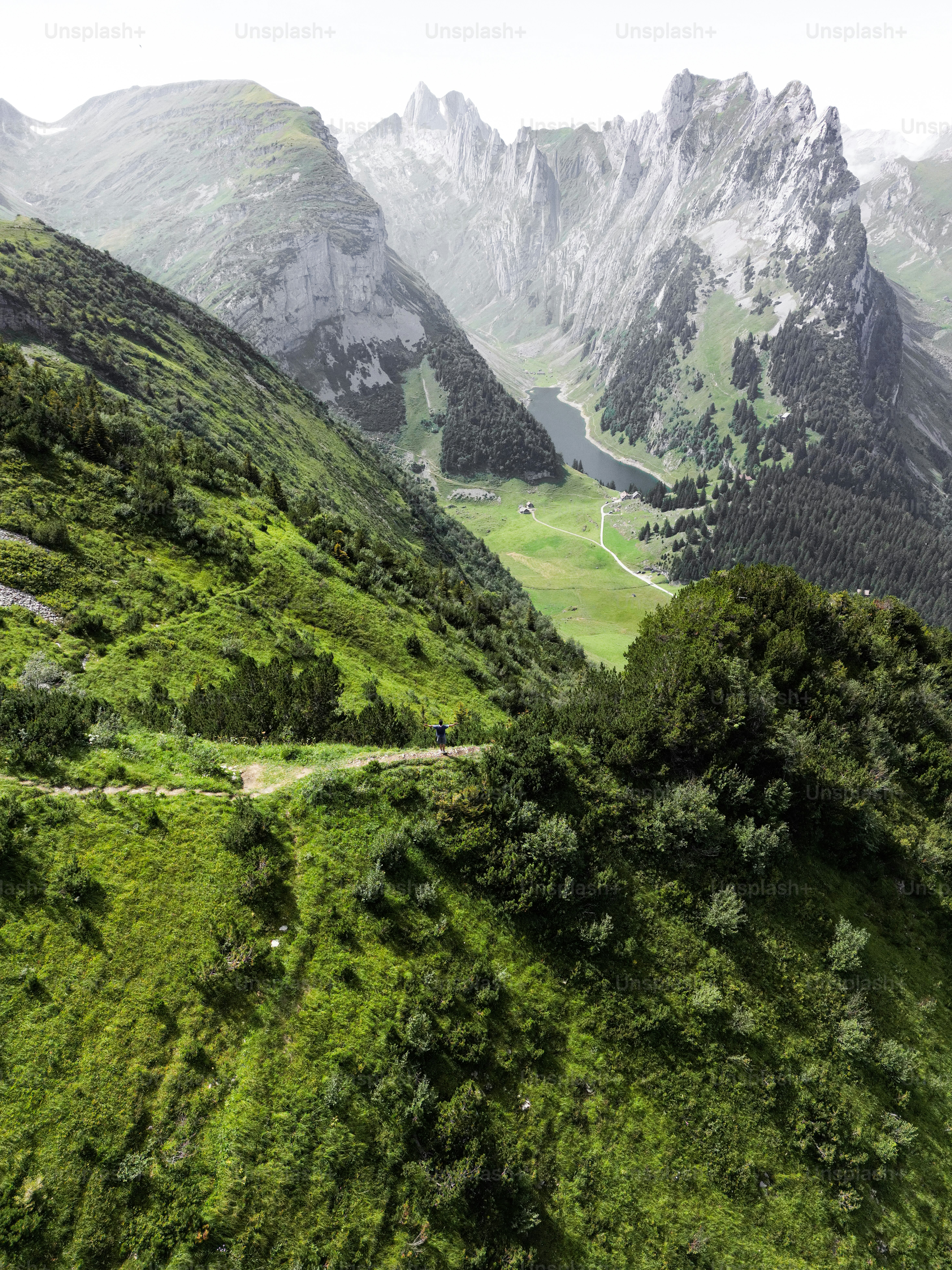 A scenic view of a green mountain range