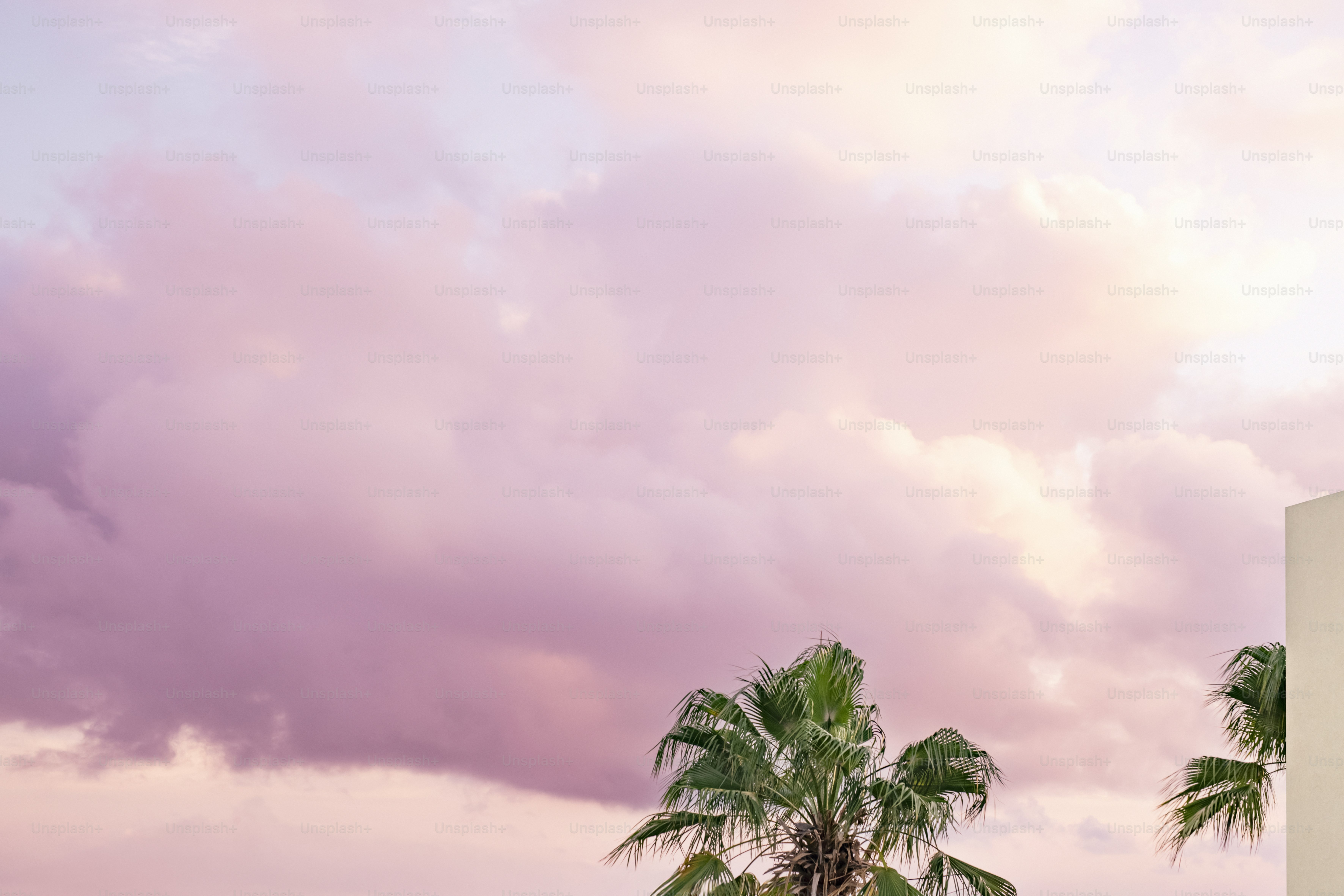 A tall white building with a clock on it's side