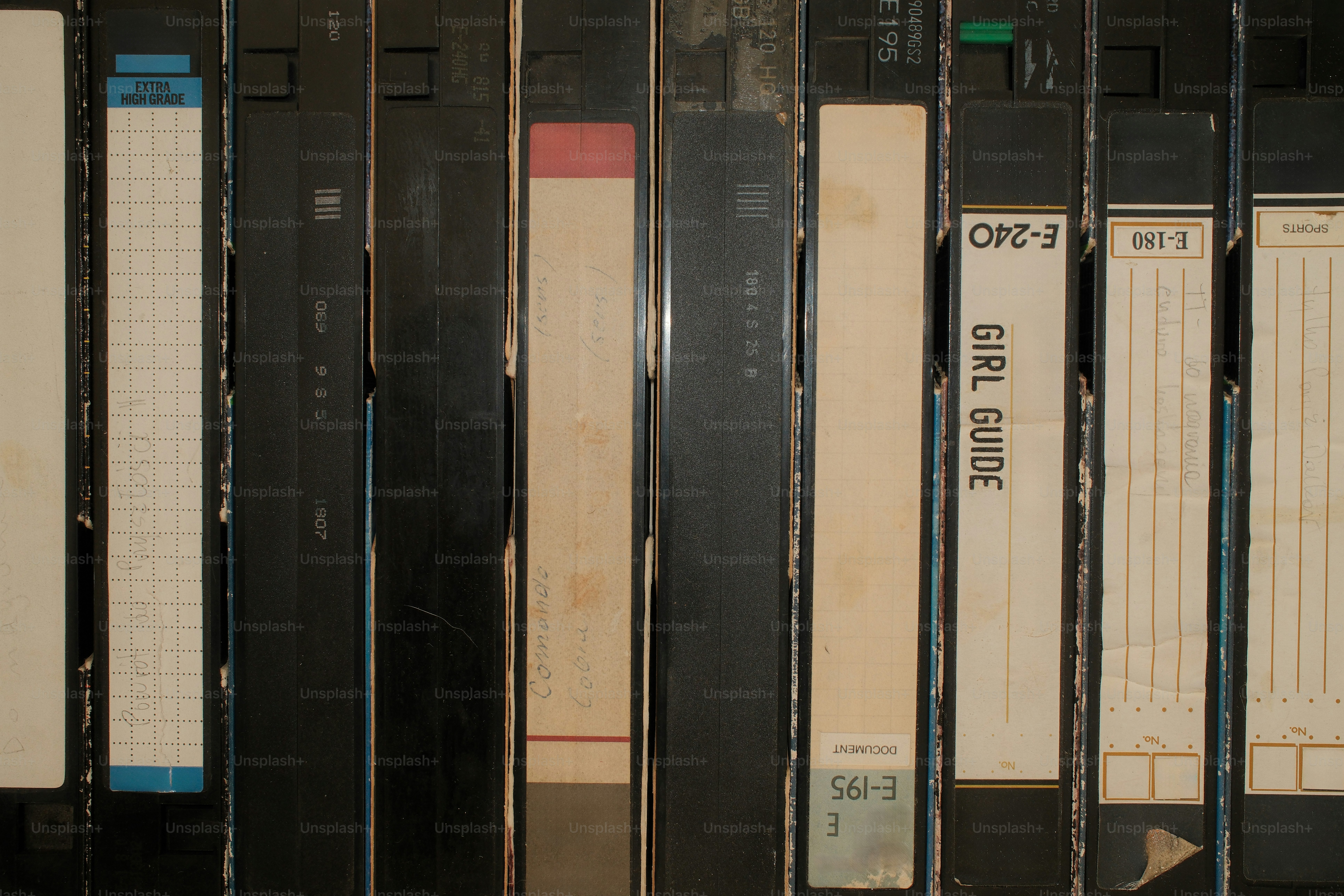 A row of binders sitting next to each other