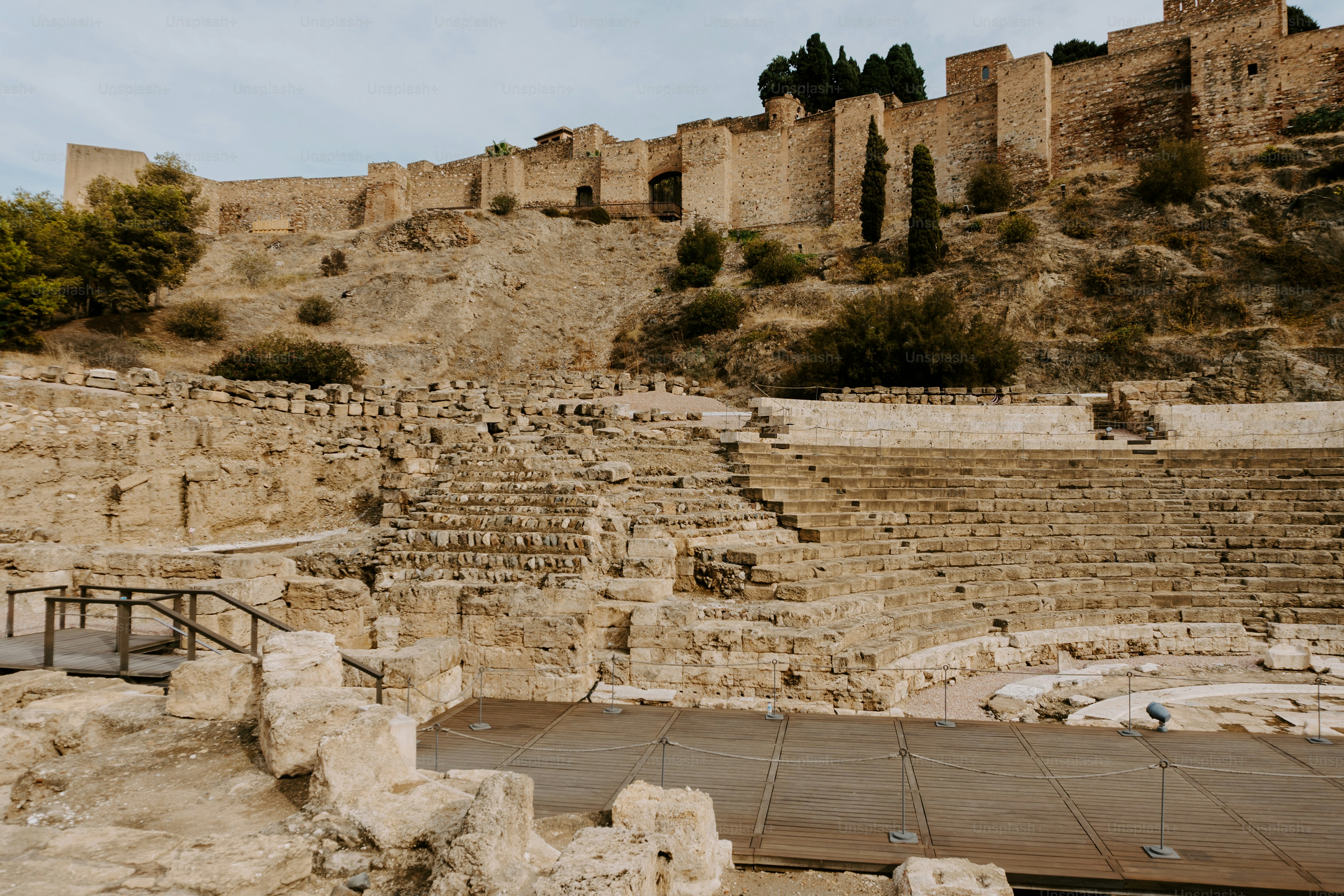 A stone building with steps leading up to it