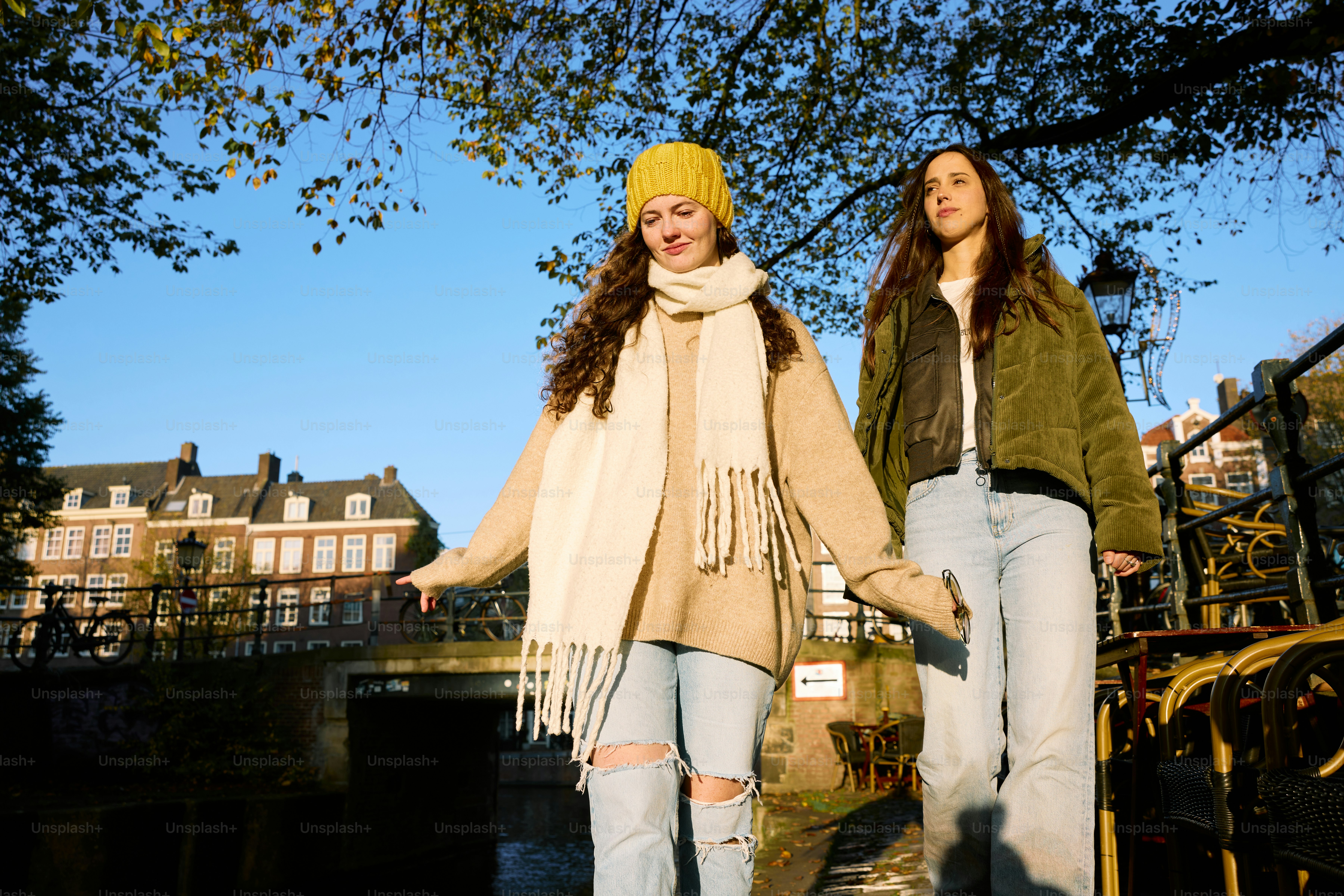 Two young women standing next to each other