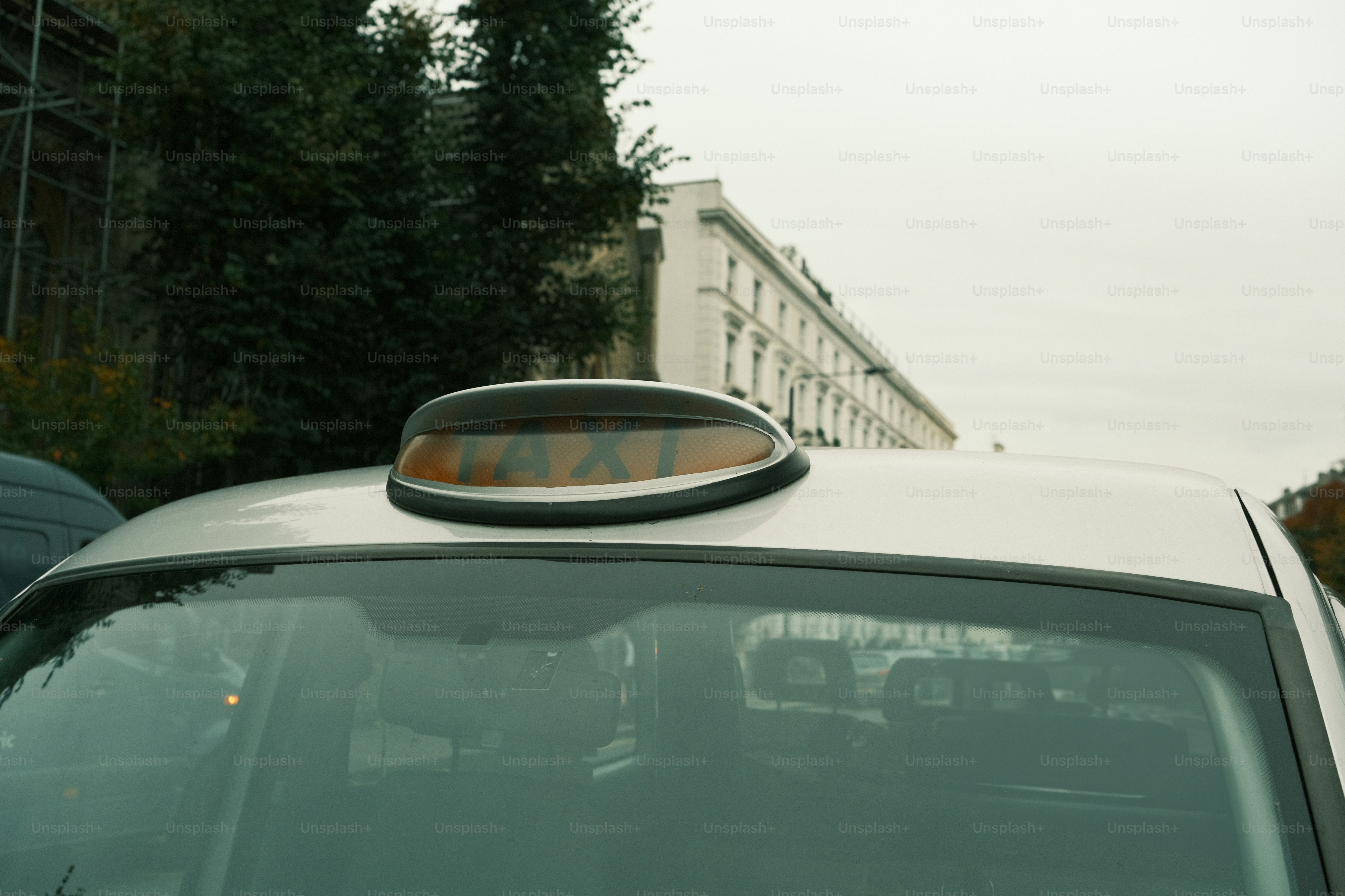 A close up of a car with a yellow light on top