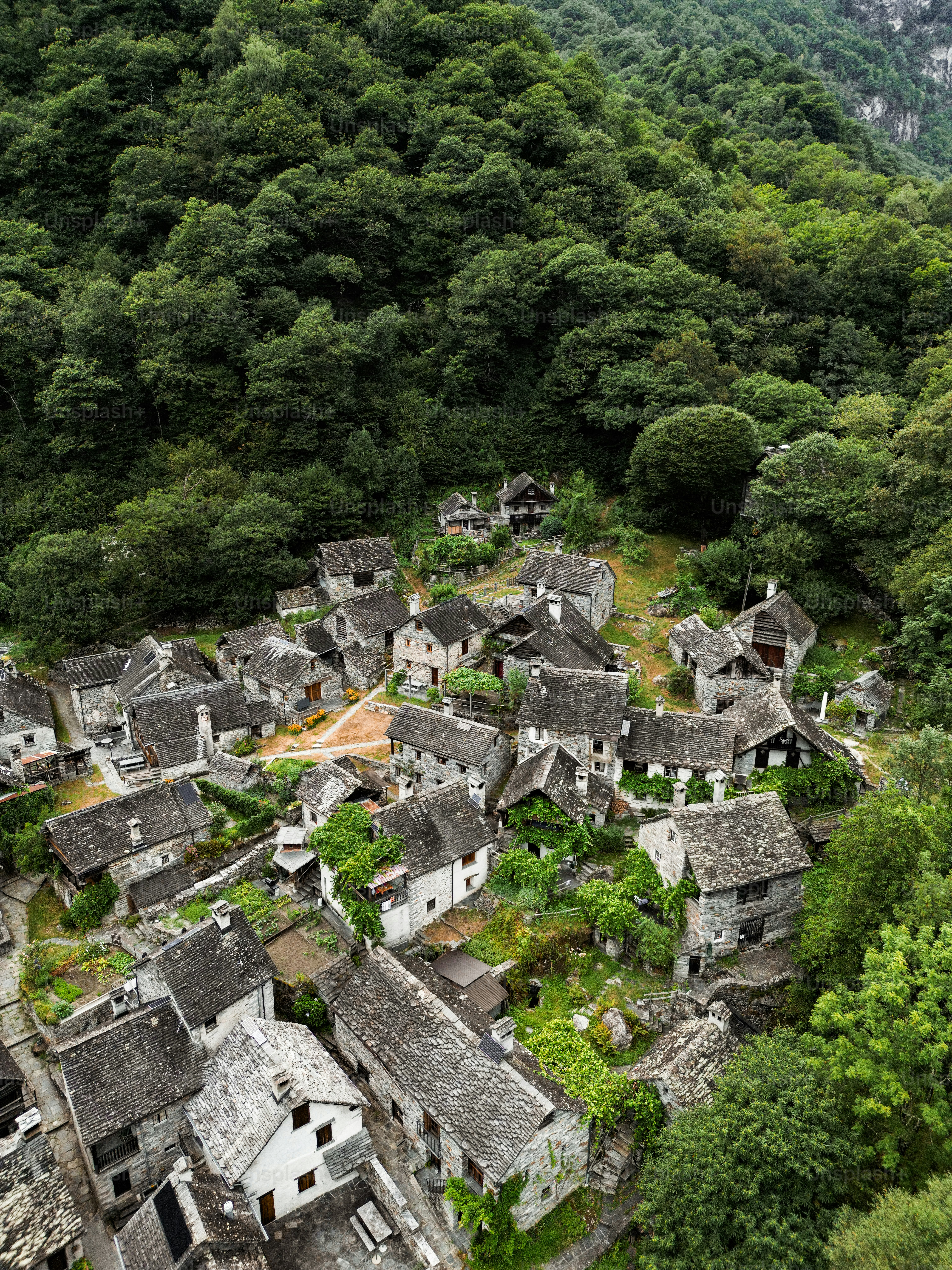 An aerial view of a village in the mountains