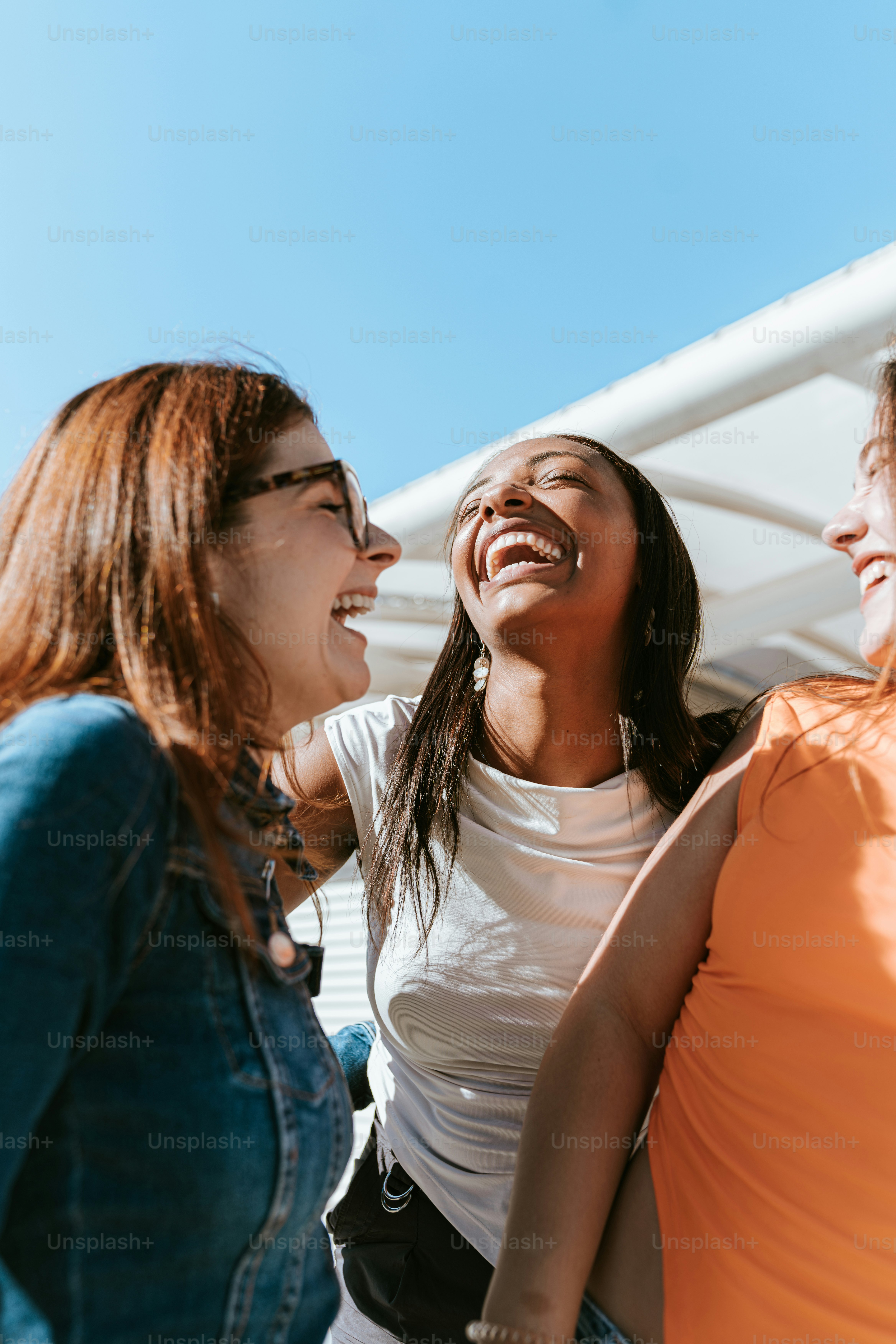 A group of women standing next to each other