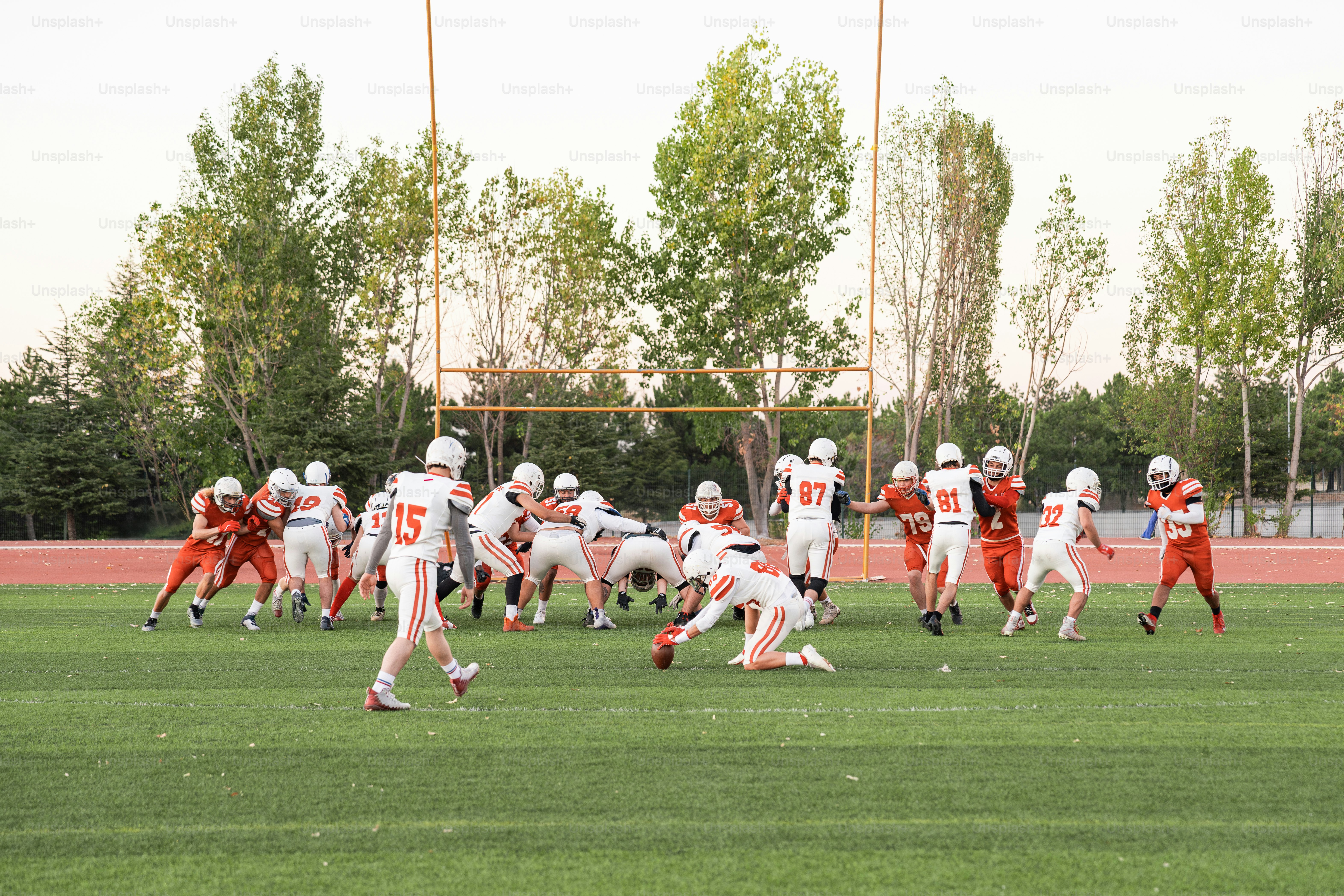 A group of people playing a game of football
