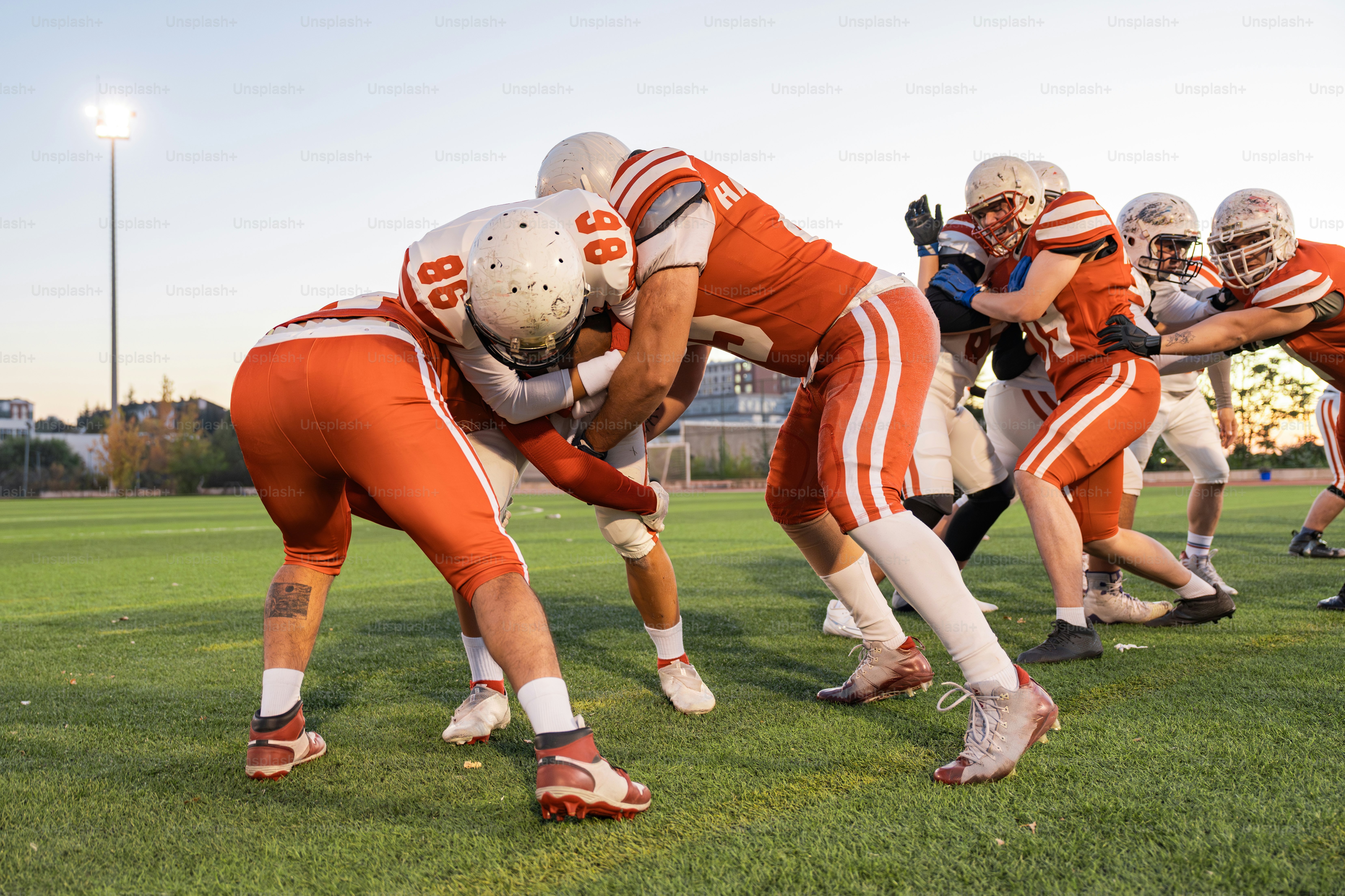 A group of young men playing a game of football