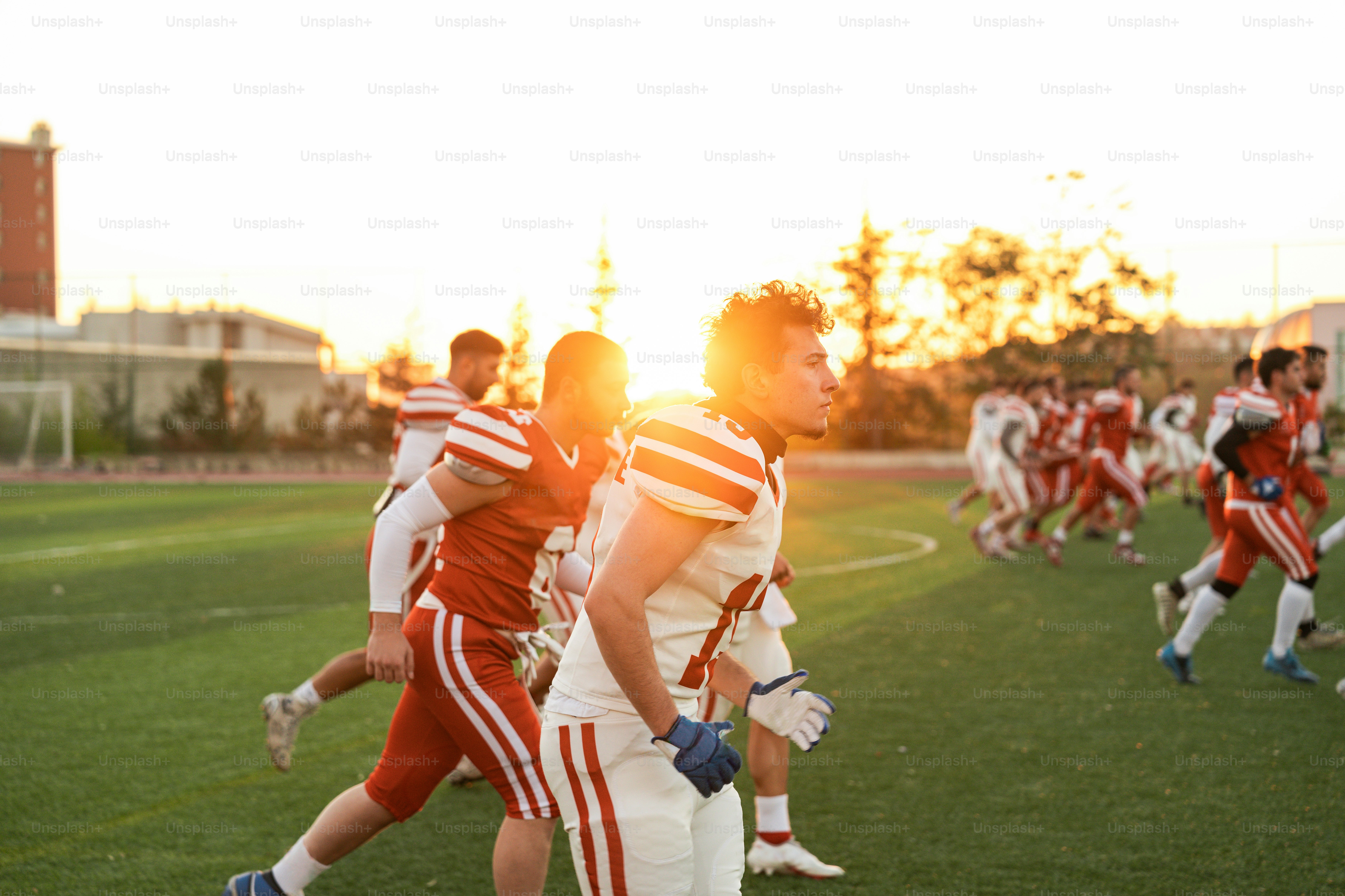 A group of men playing a game of soccer photo – Football Image on Unsplash