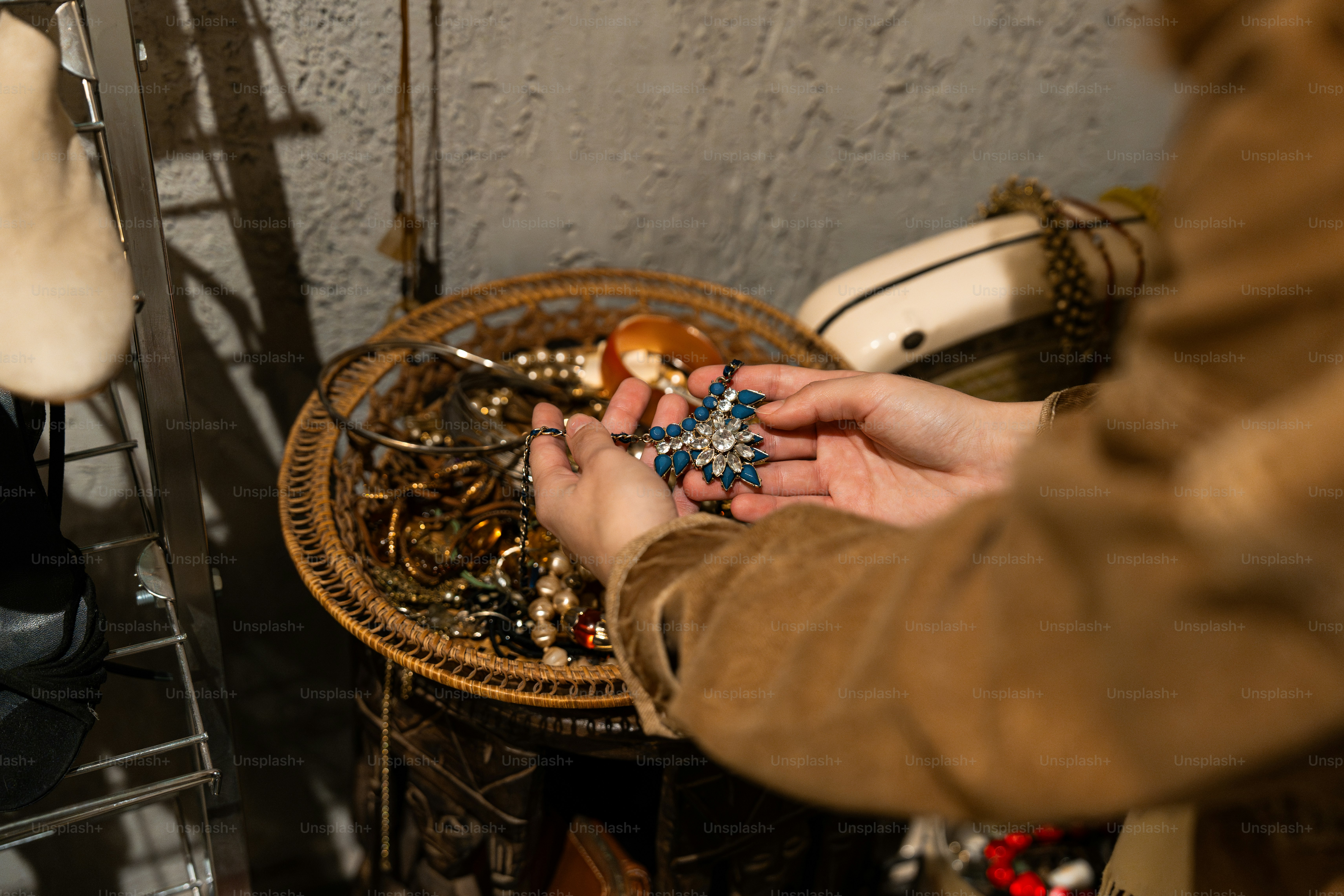 A person holding a small item in their hands