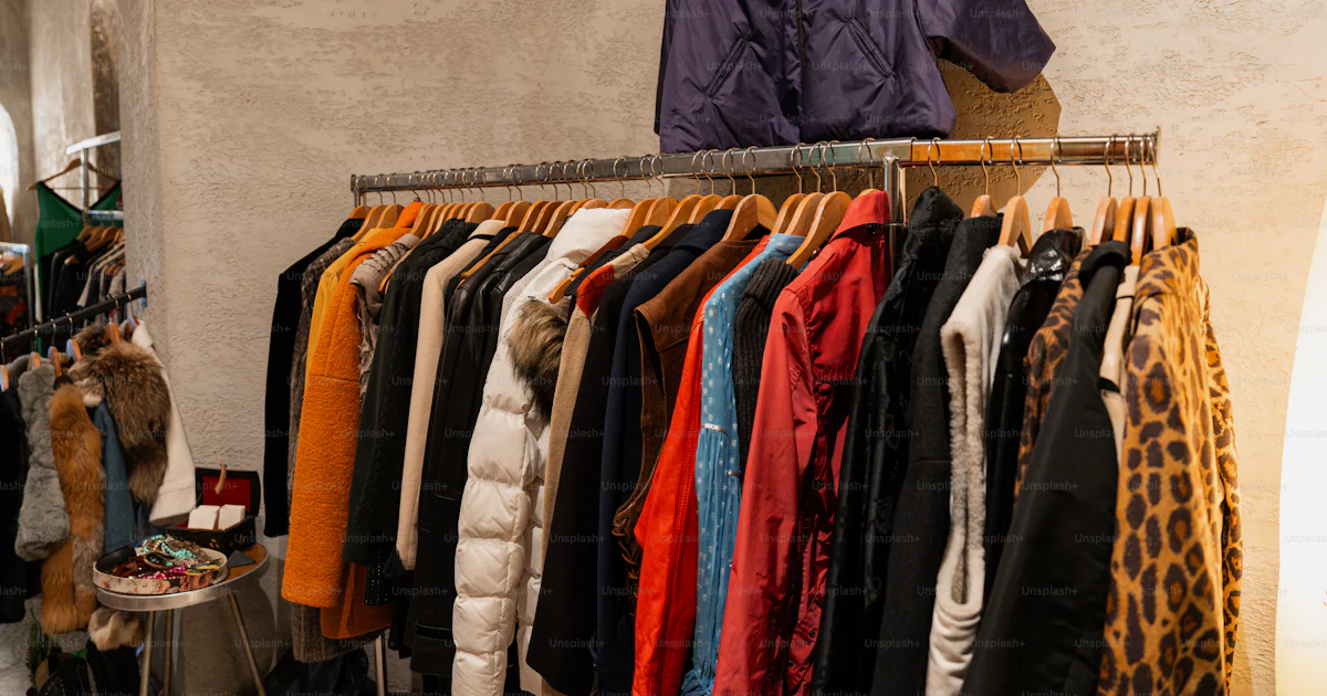 A rack of clothes in a clothing store photo – Thrifting Image on Unsplash