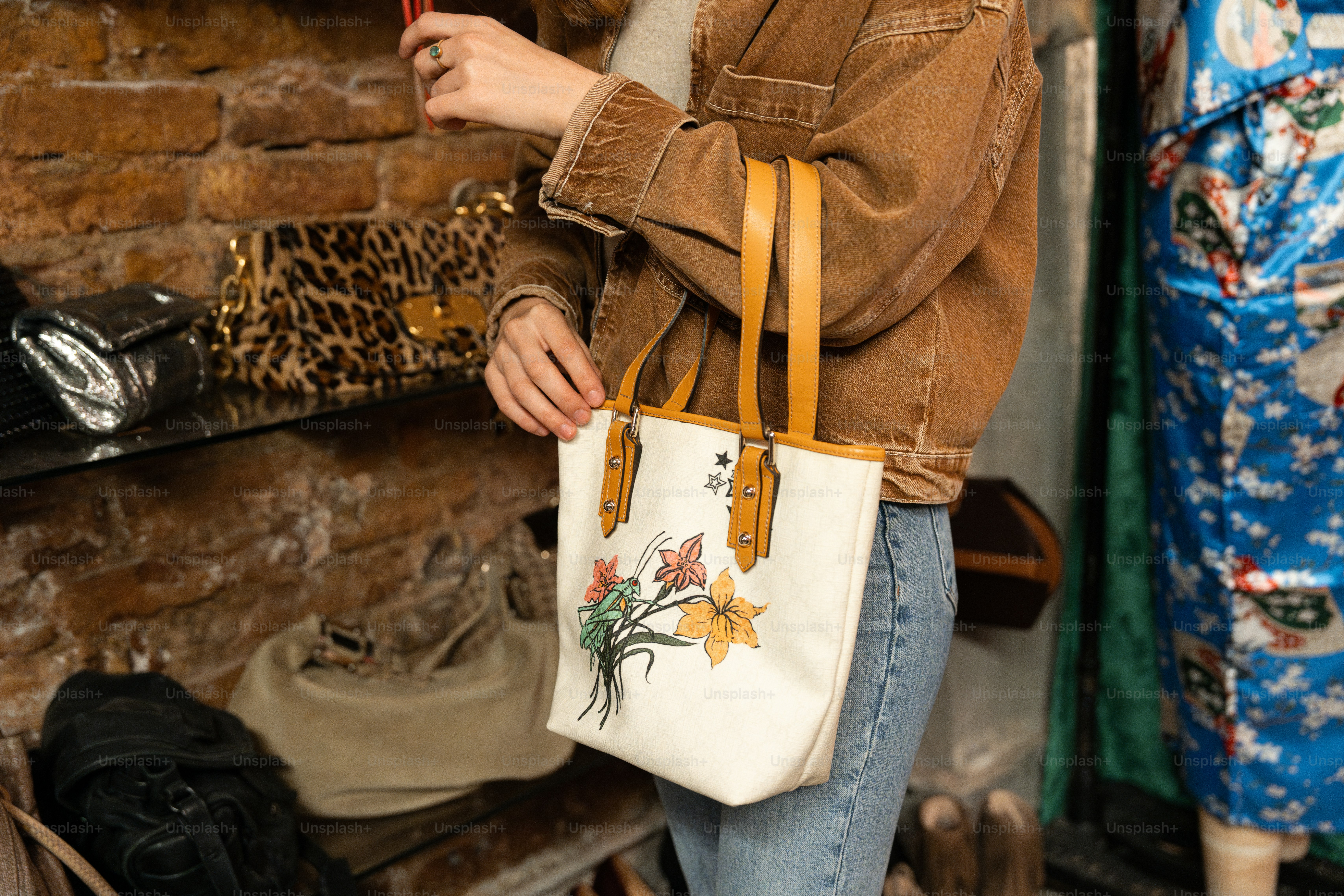 A woman is looking at her cell phone