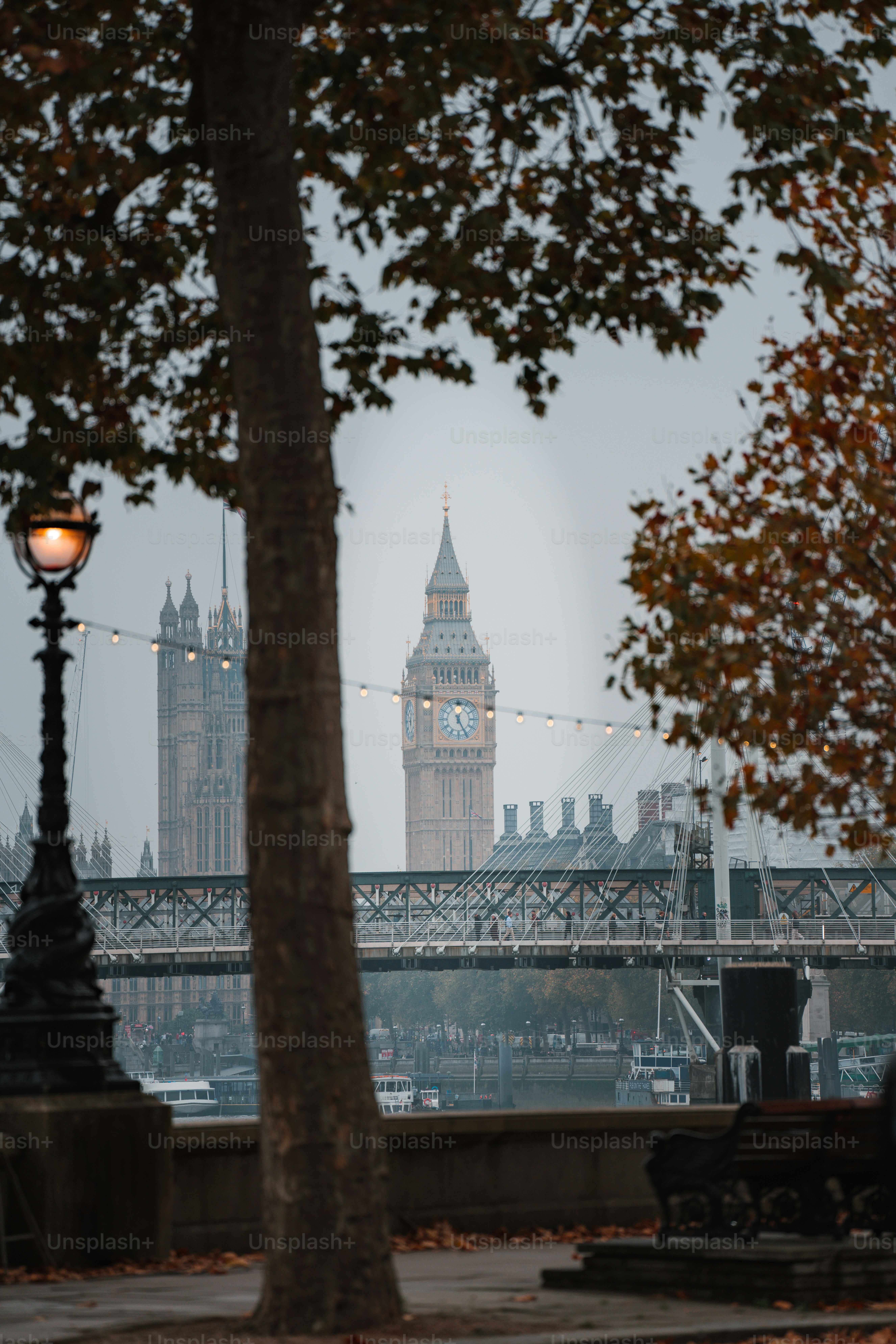 The big ben clock tower towering over the city of london