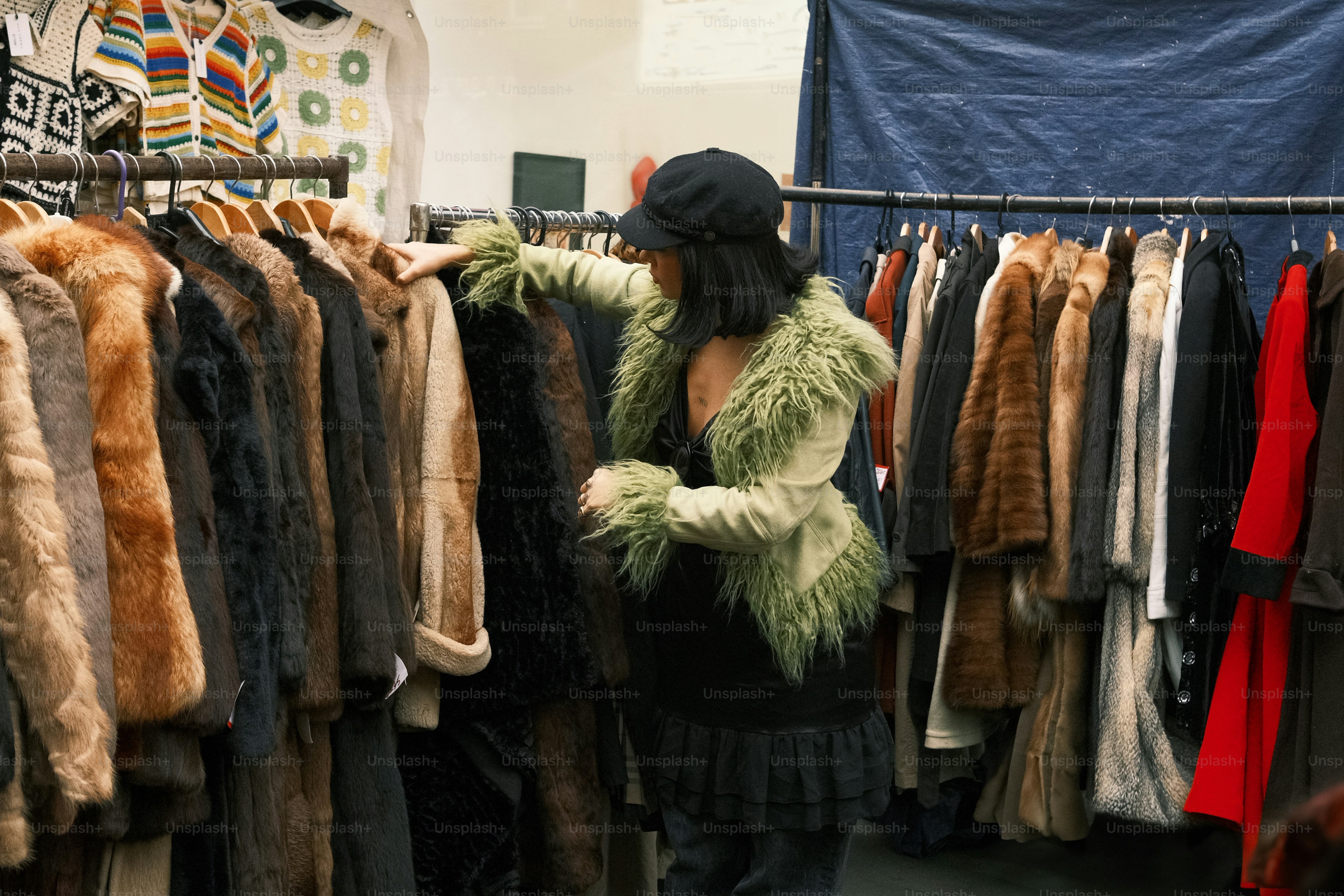 Shopper exploring secondhand options as part of low waste fashion habits