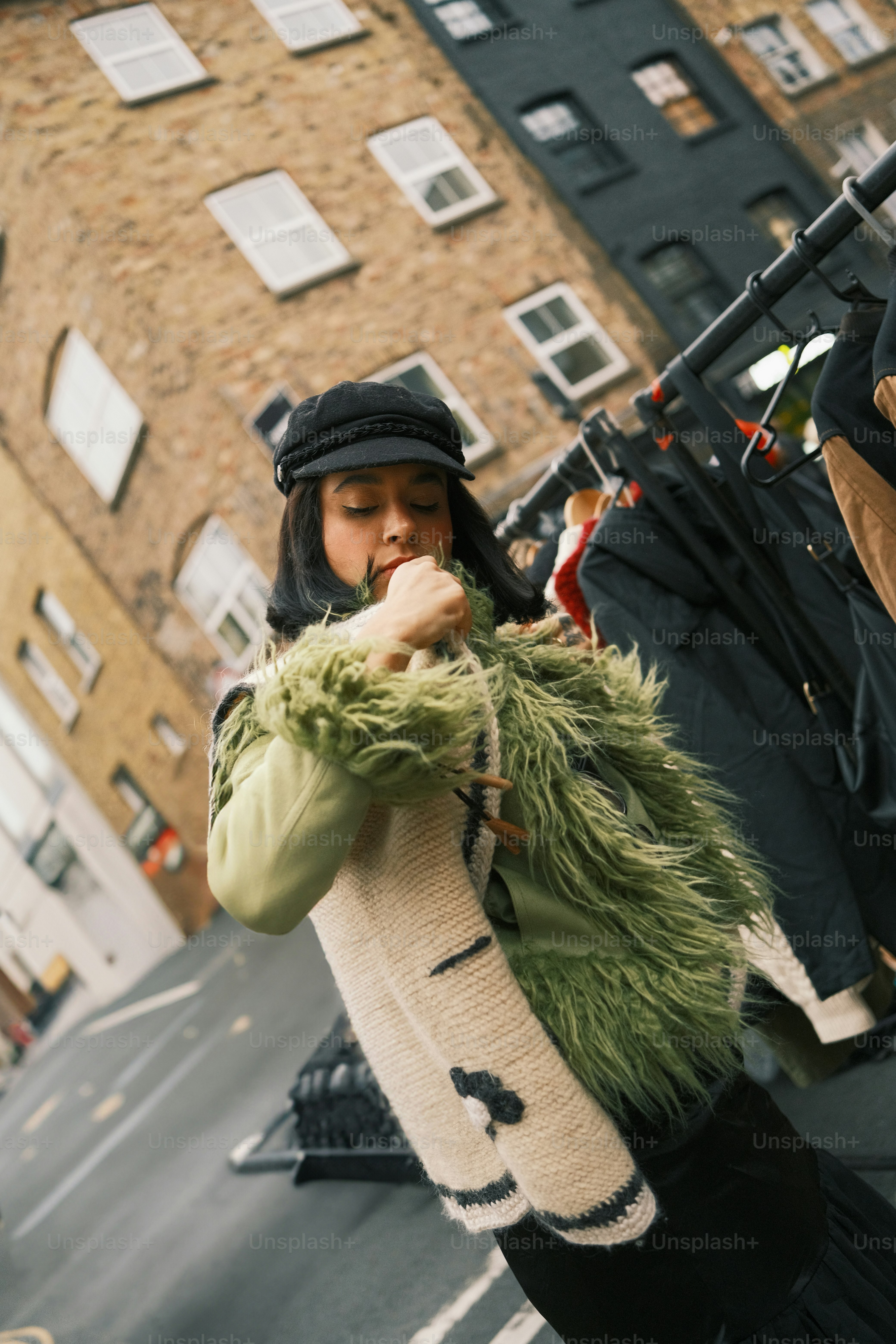 A woman standing next to a man on a street