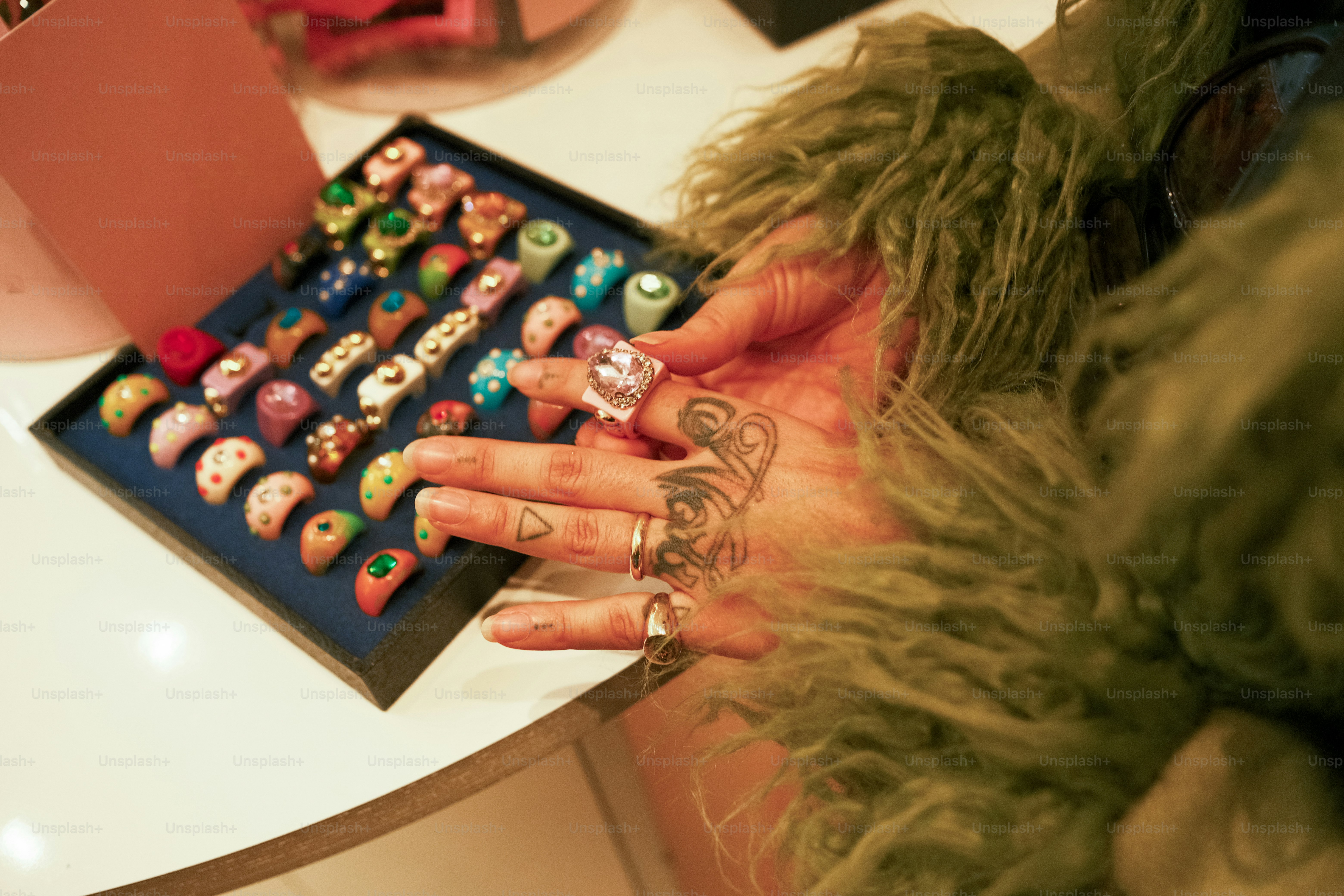 A close up of a person wearing a furry coat