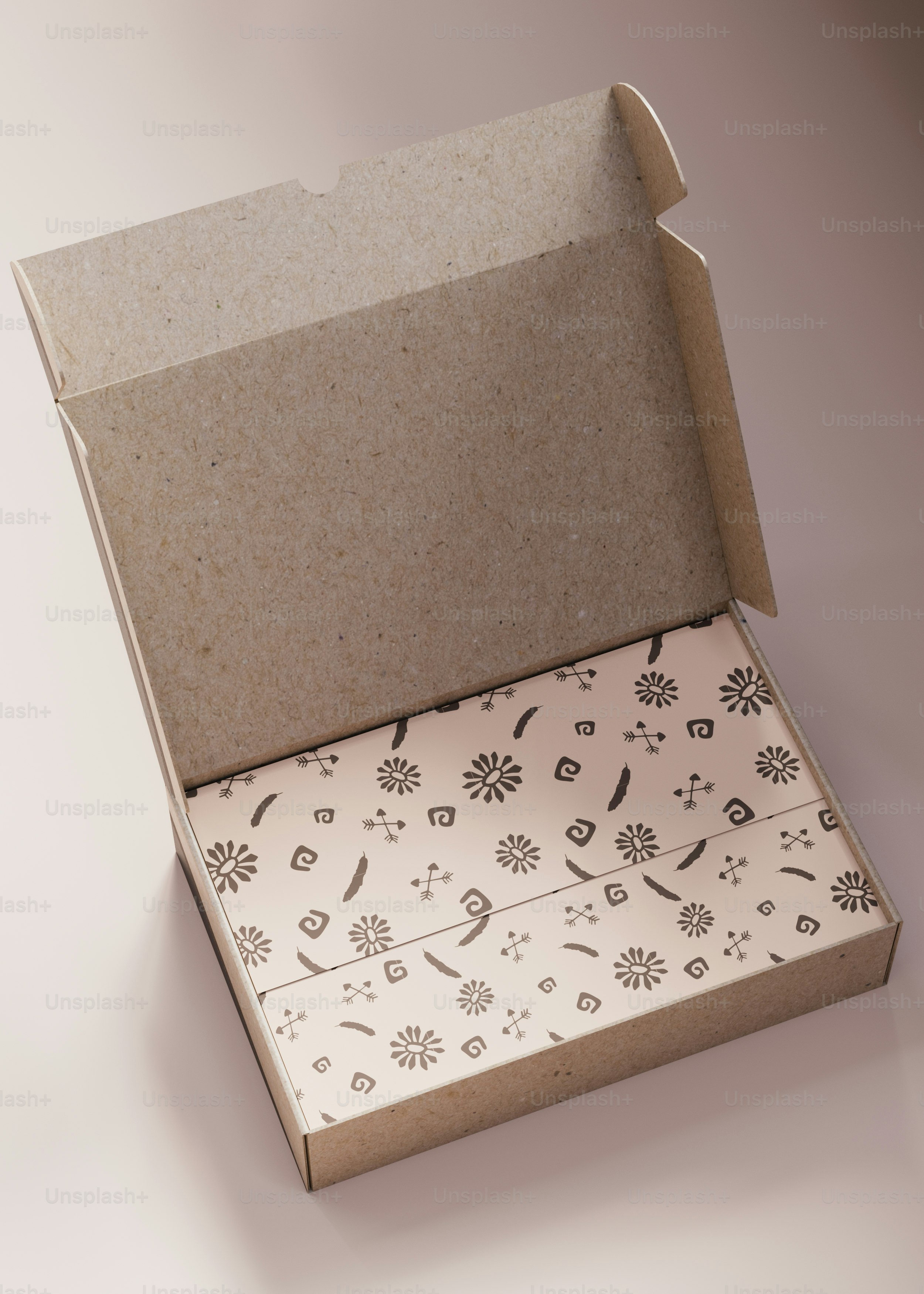 A cardboard box with a flower pattern inside