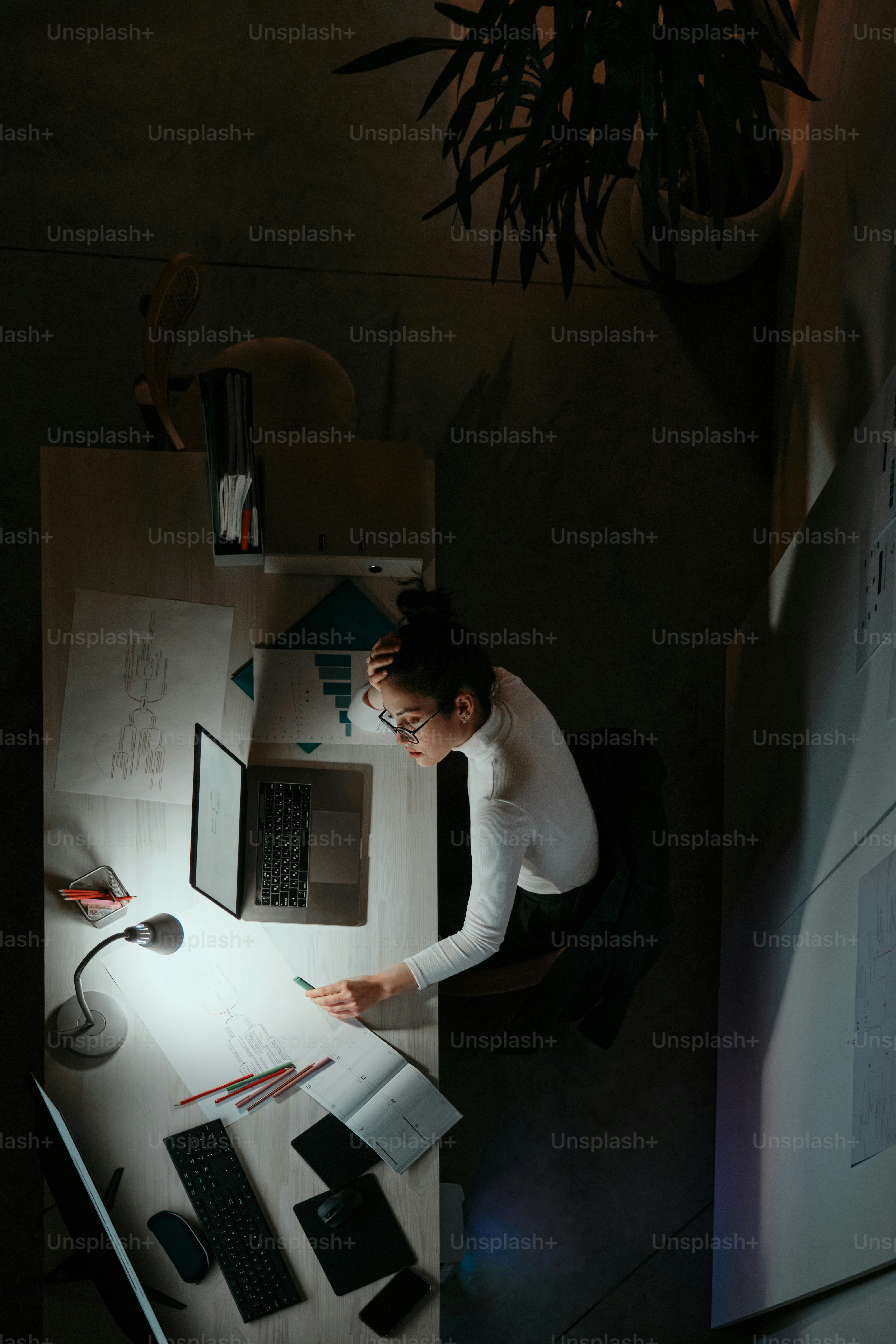 an office worker at night in the office