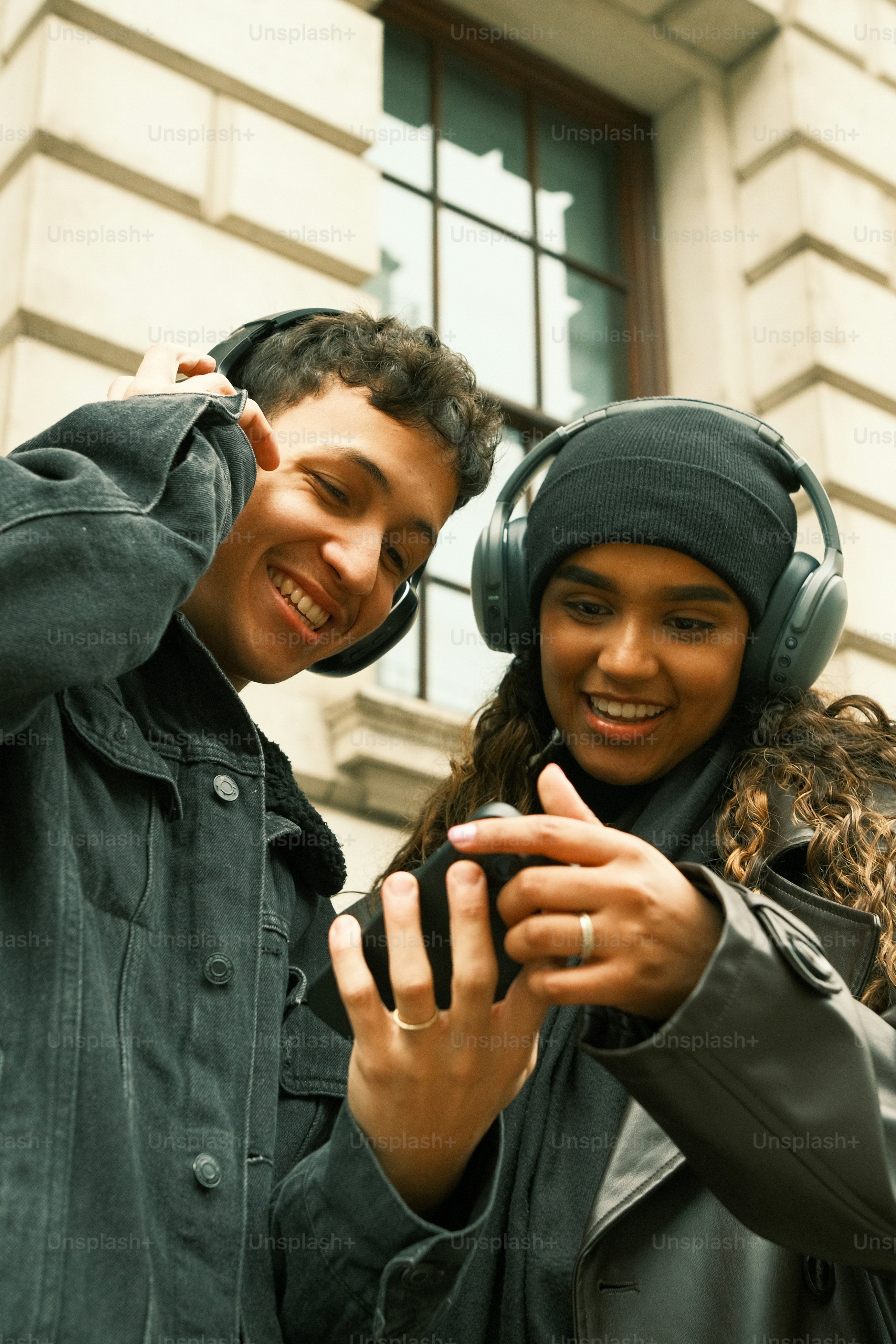 A man and a woman standing next to each other