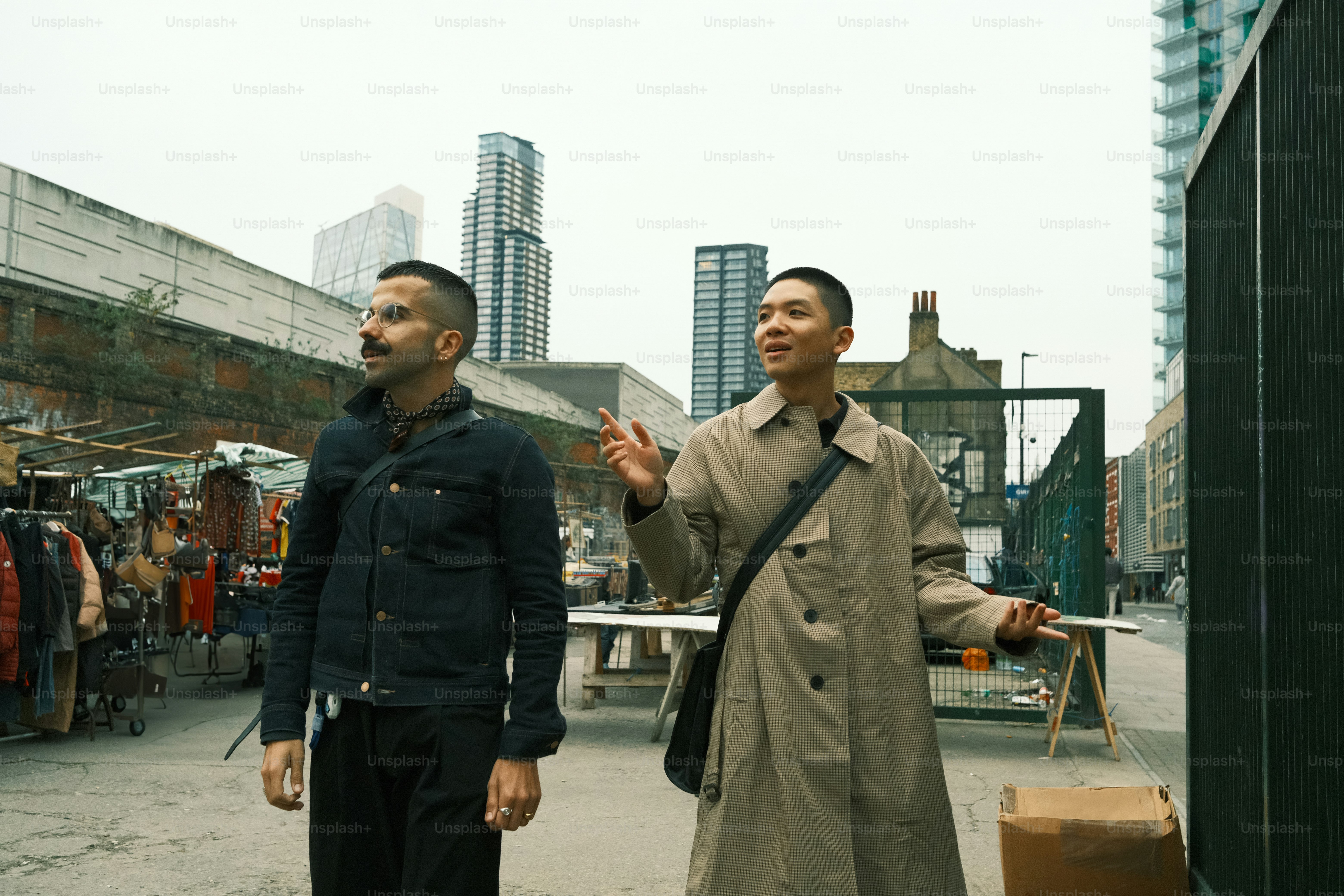 A couple of men standing next to each other
