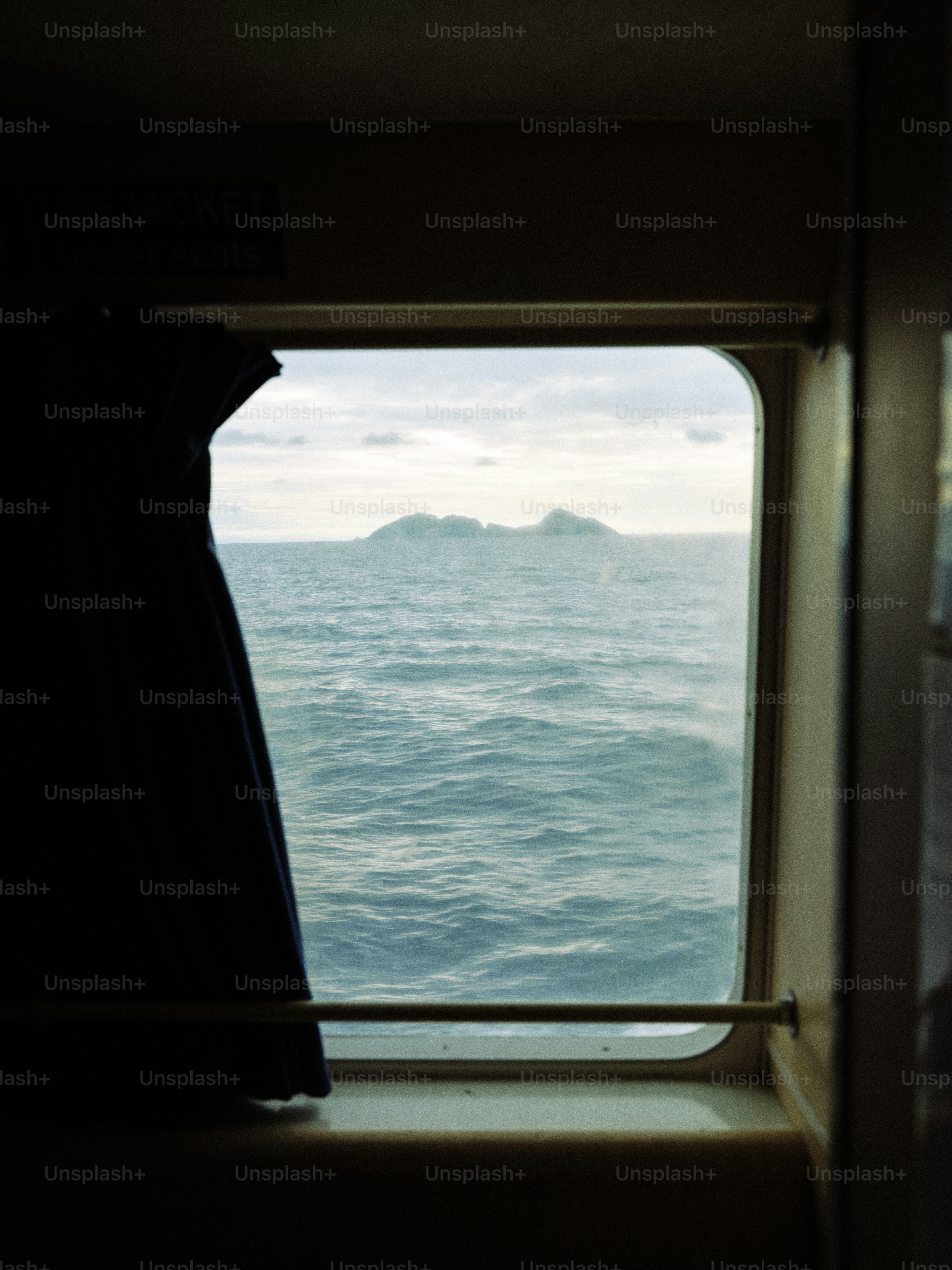 A view of a body of water through a window