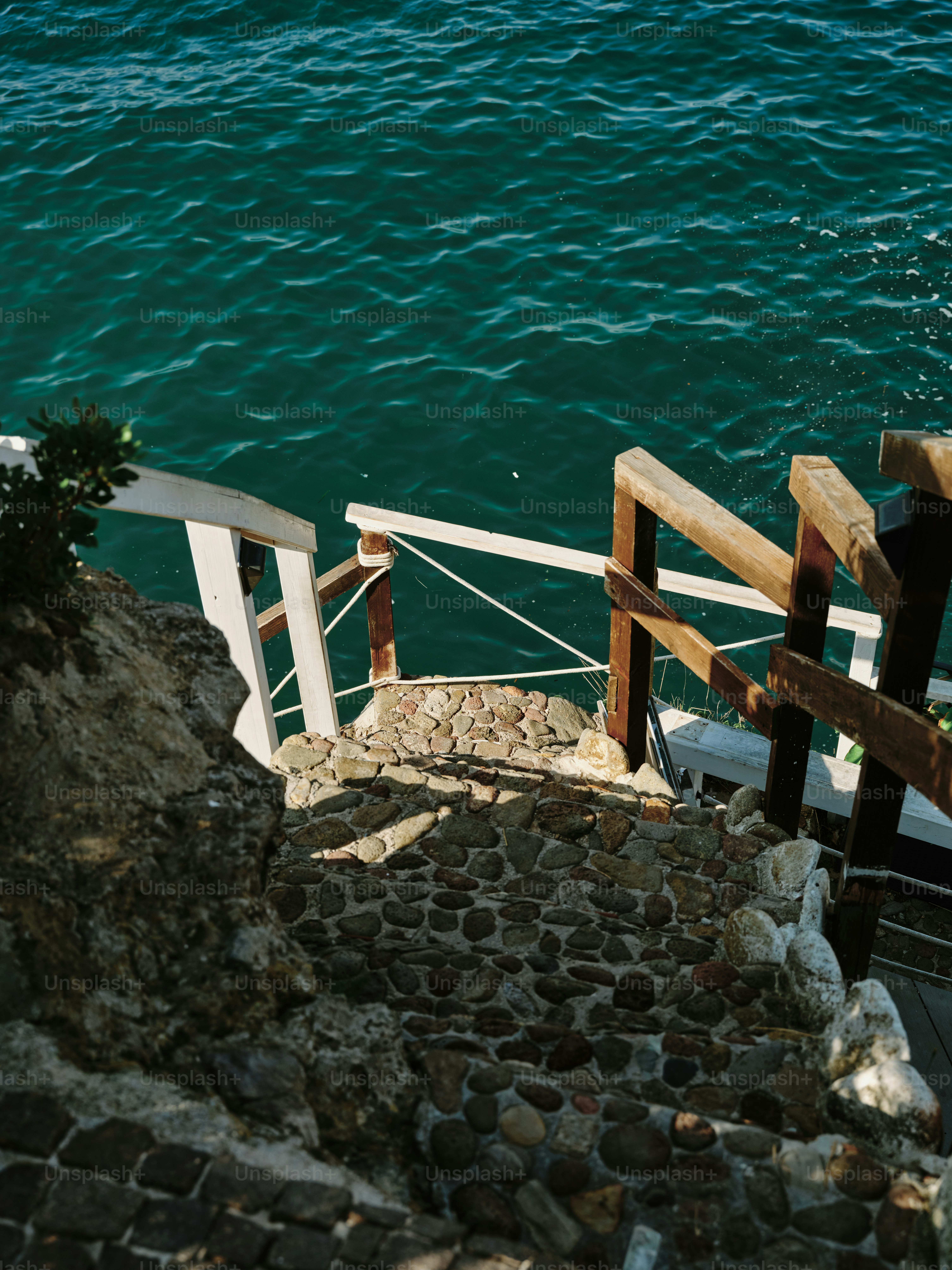 A staircase leading down to a body of water