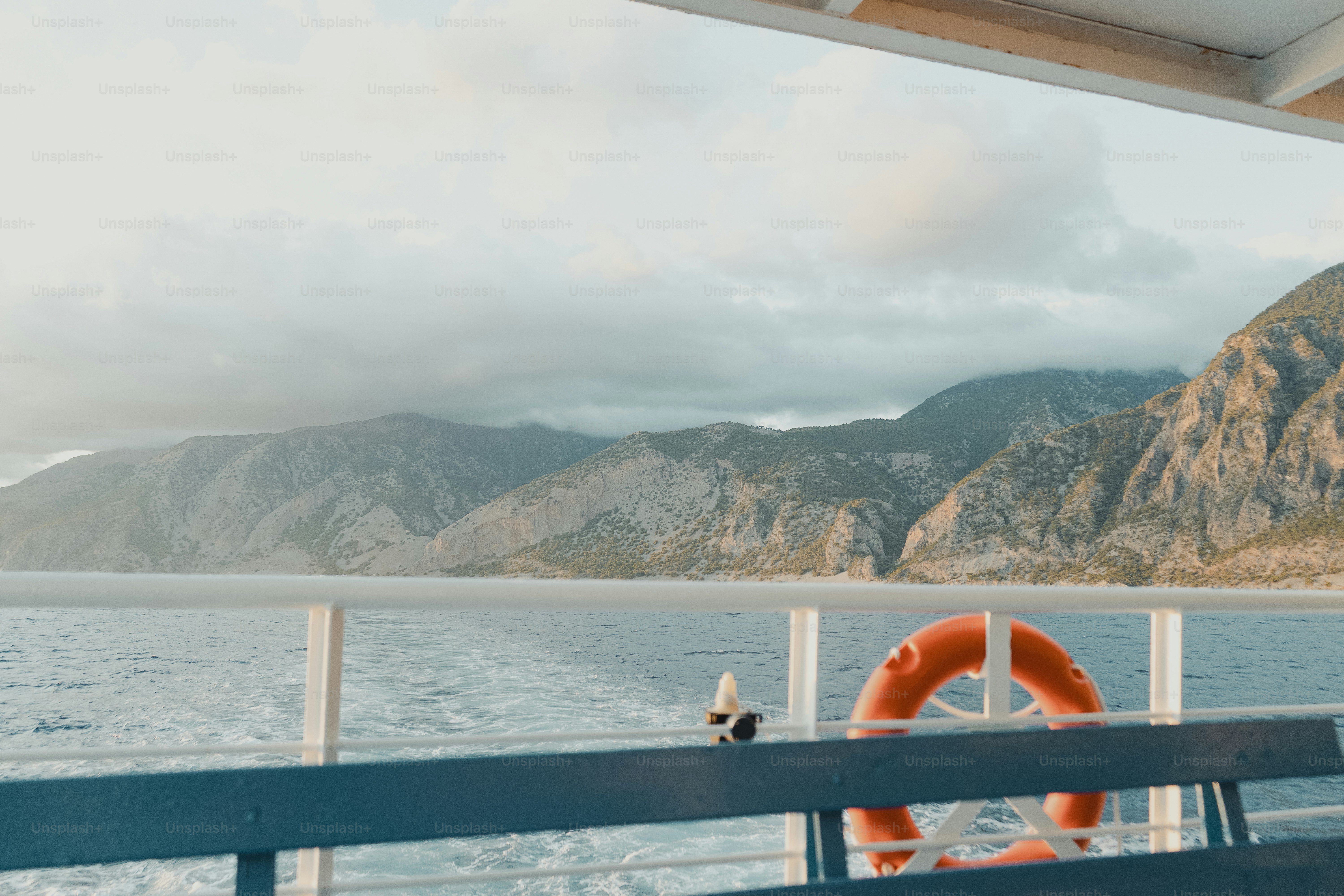 A boat with a life preserver on the deck