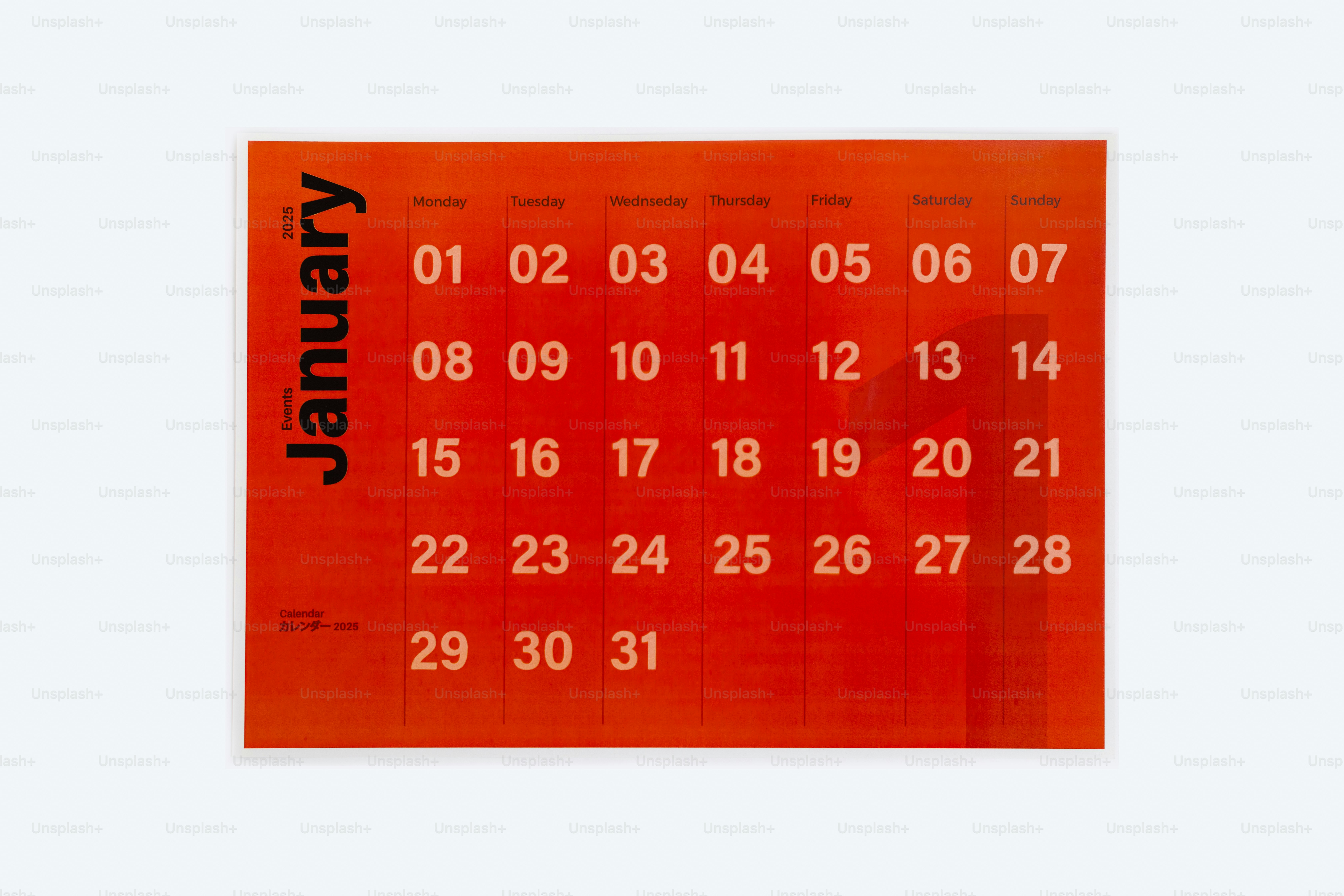 A red calendar with the date of the month on it