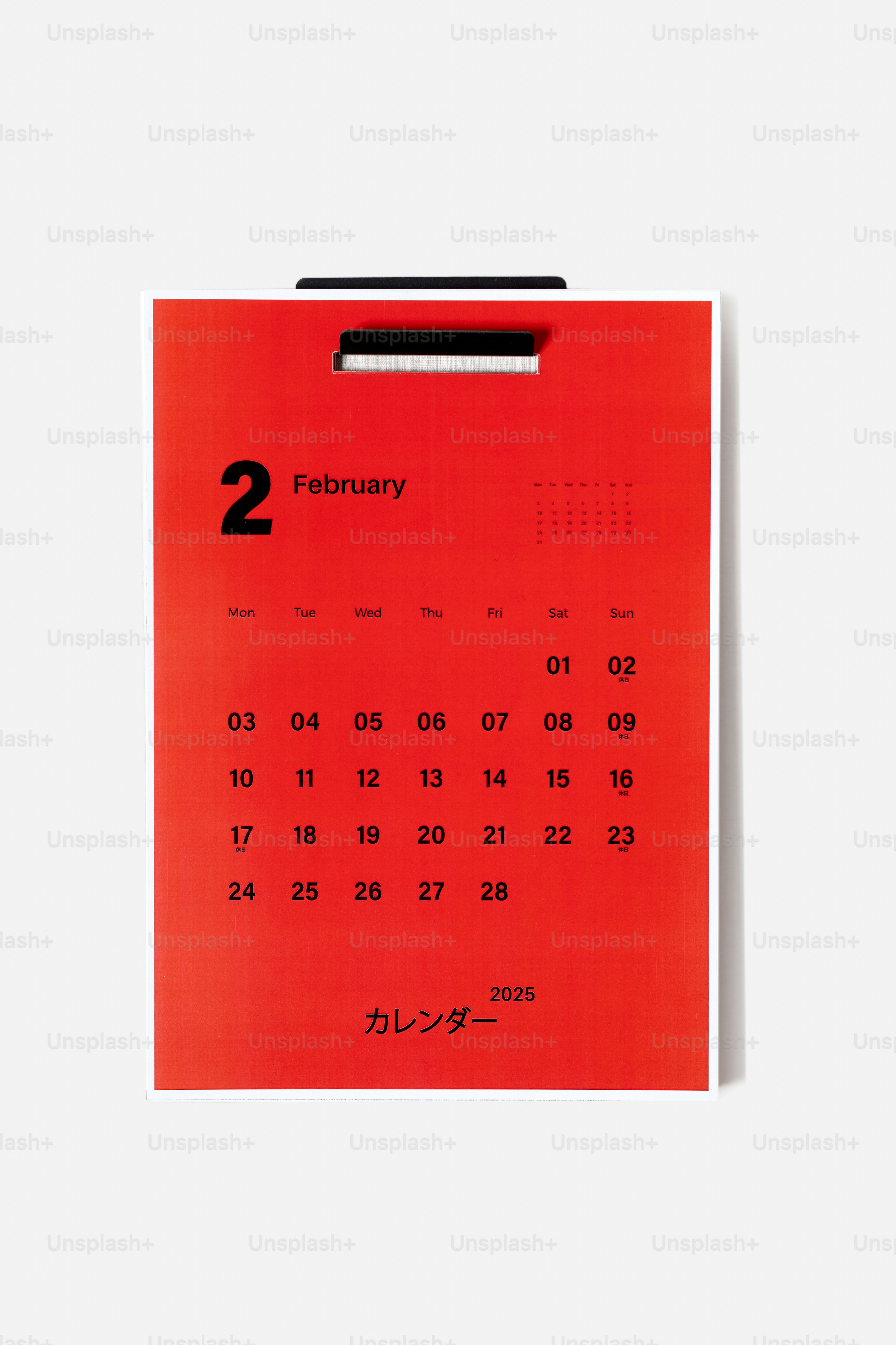 A red calendar with the date on it