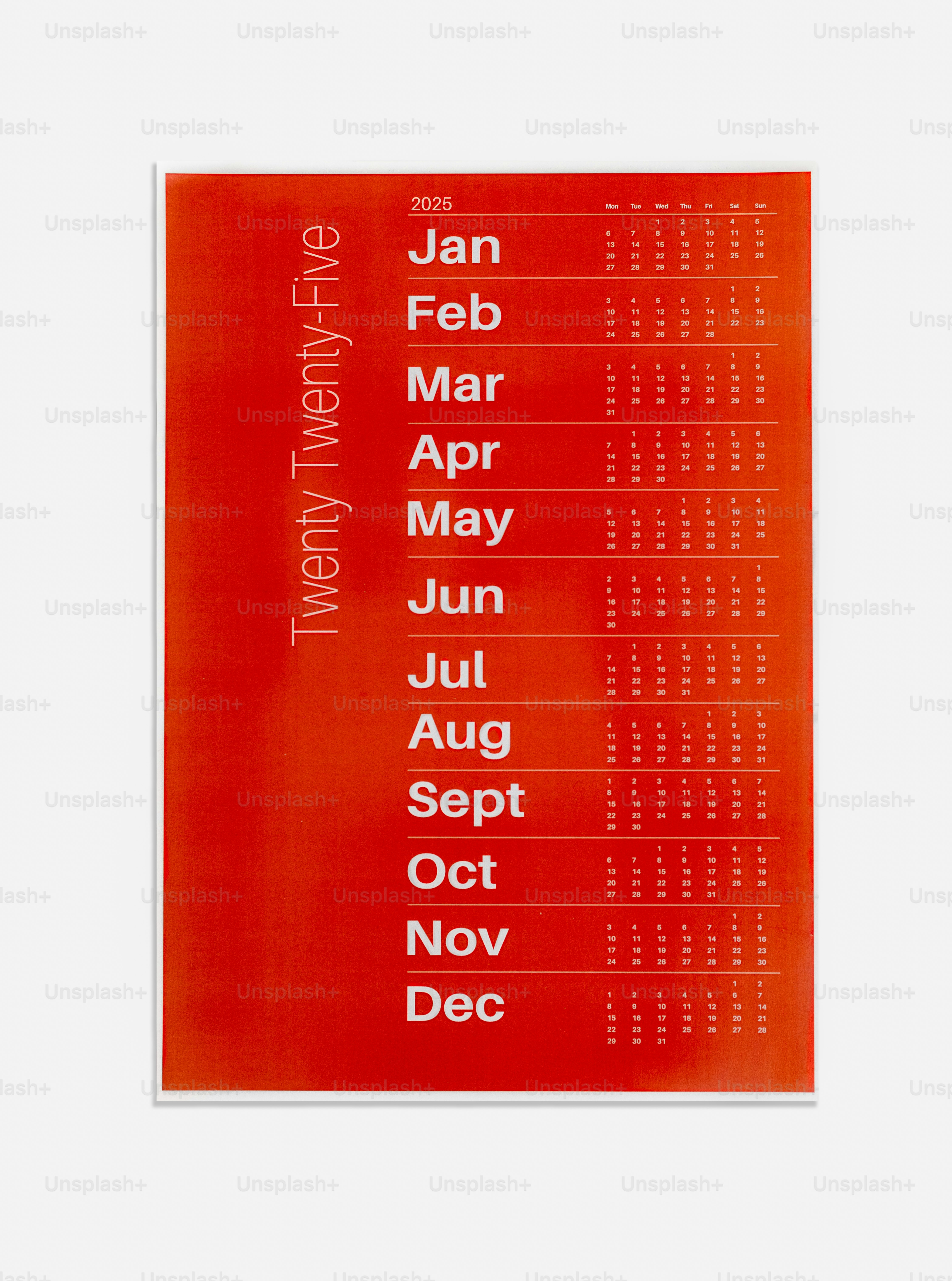 A red poster with a calendar on it