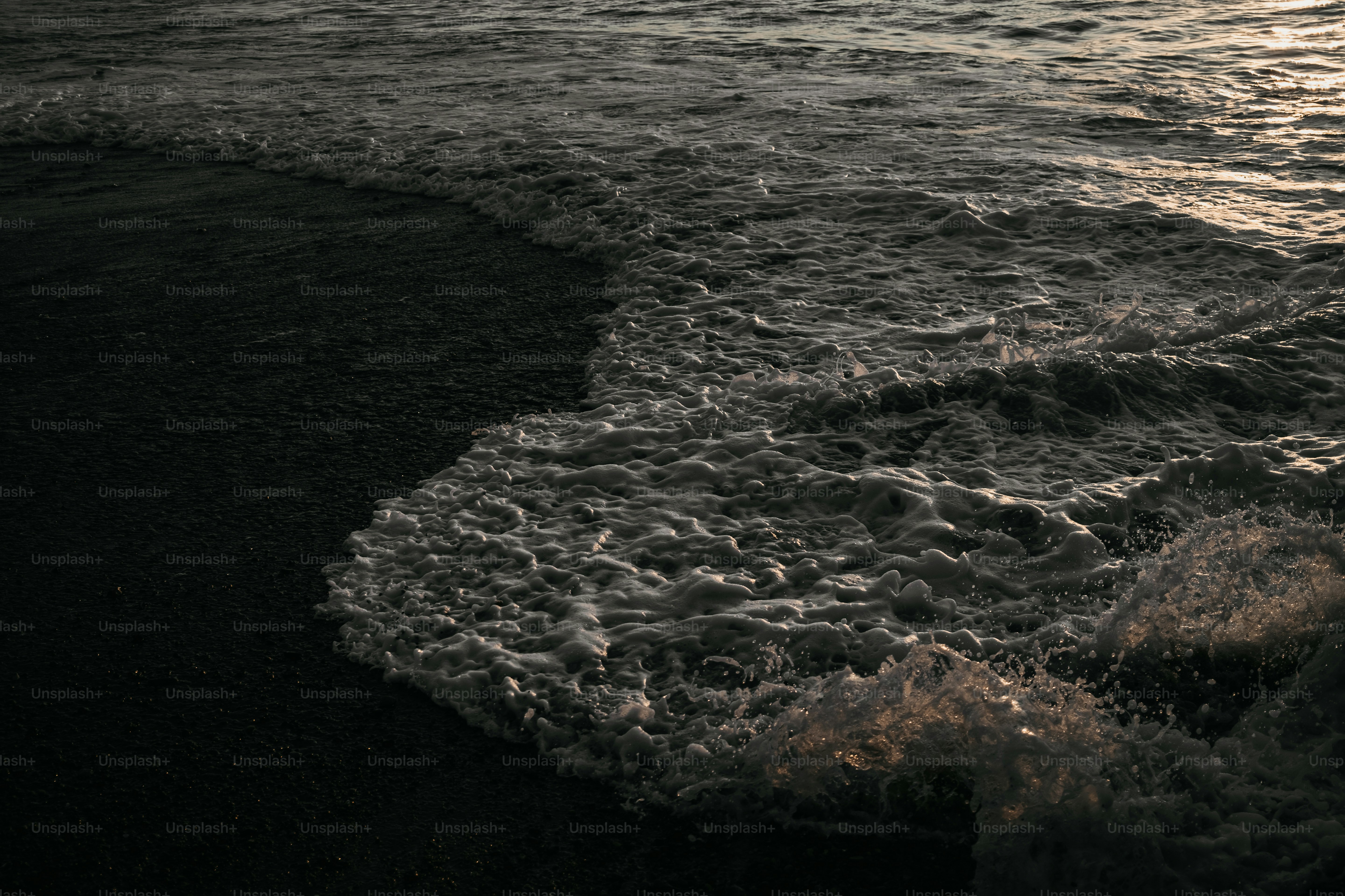 A black and white photo of the ocean