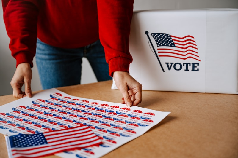 political rally, campaign signage, voting booth, politician speaking, election poster