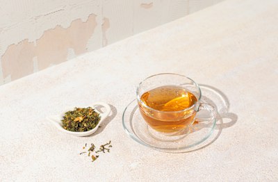 Famous Darjeeling tea cup with mountain backdrop - Veg Hotels in Darjeeling