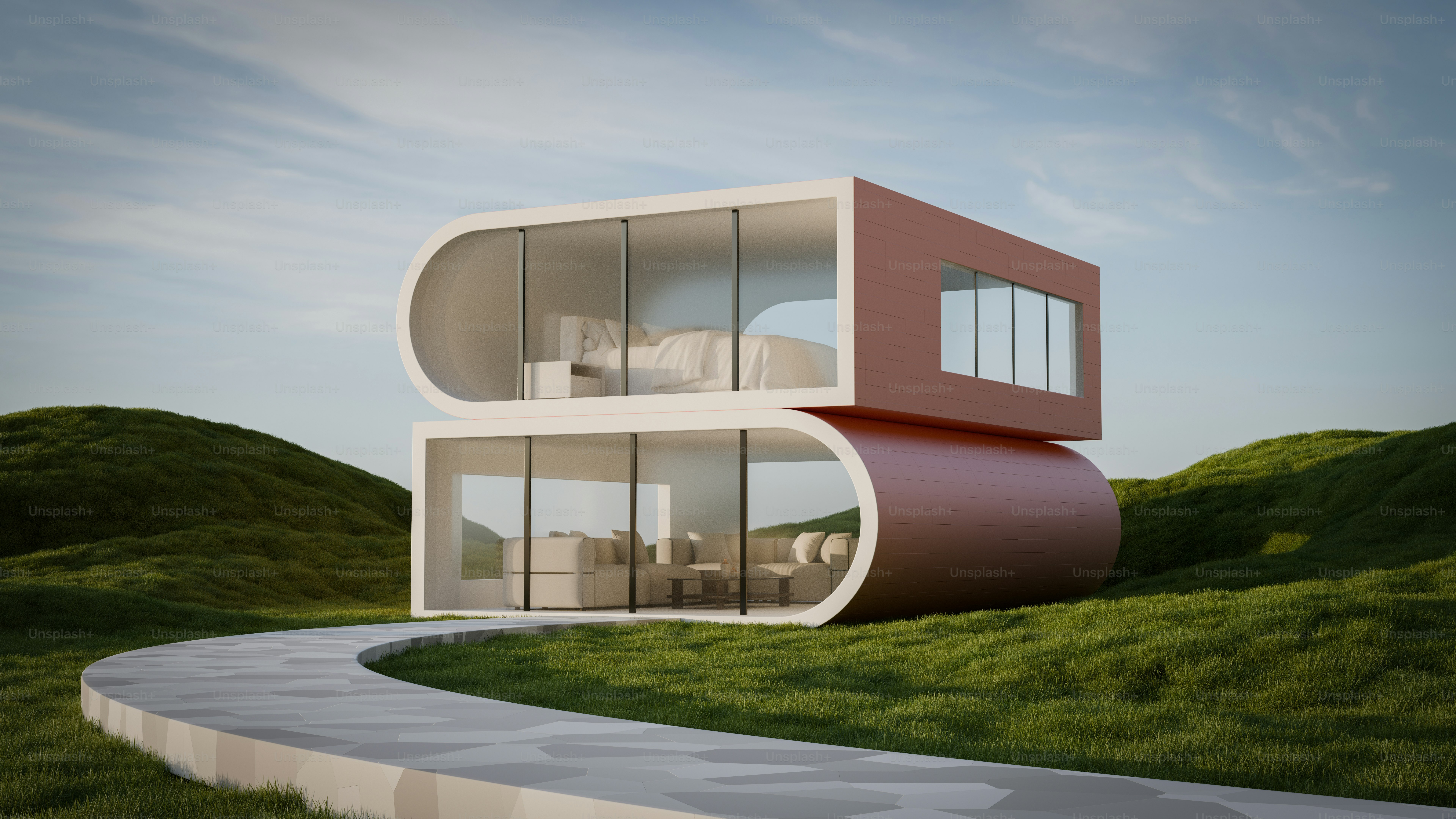 A house on a hill with a curved road in front of it