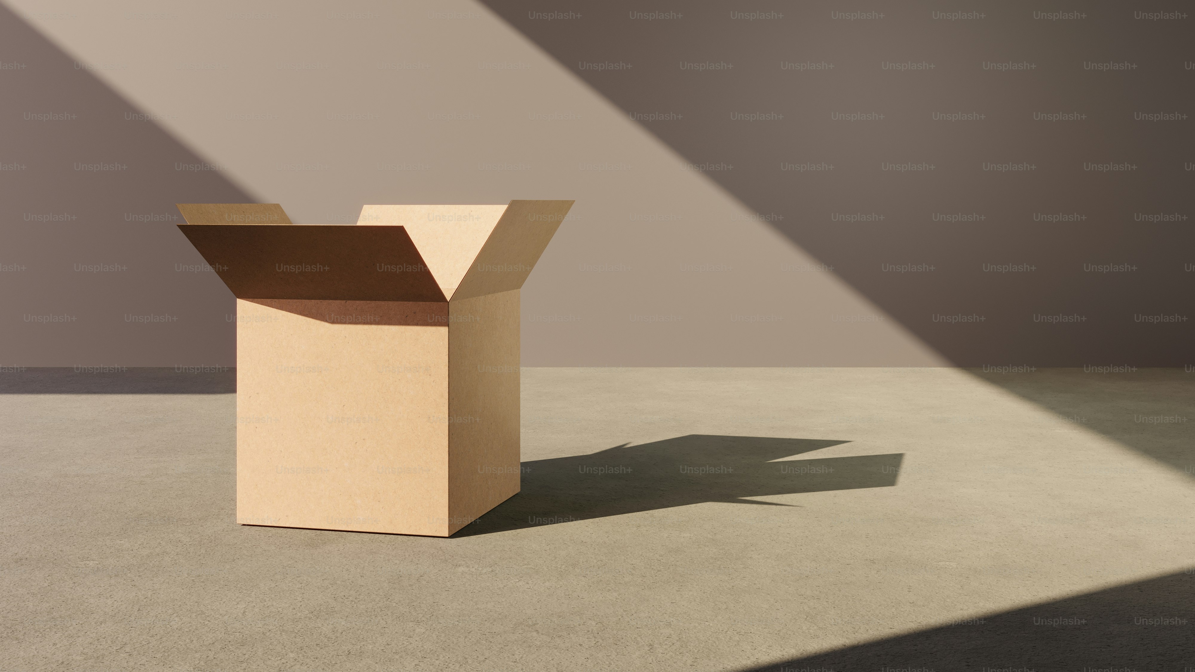 A cardboard box sitting in the middle of a room