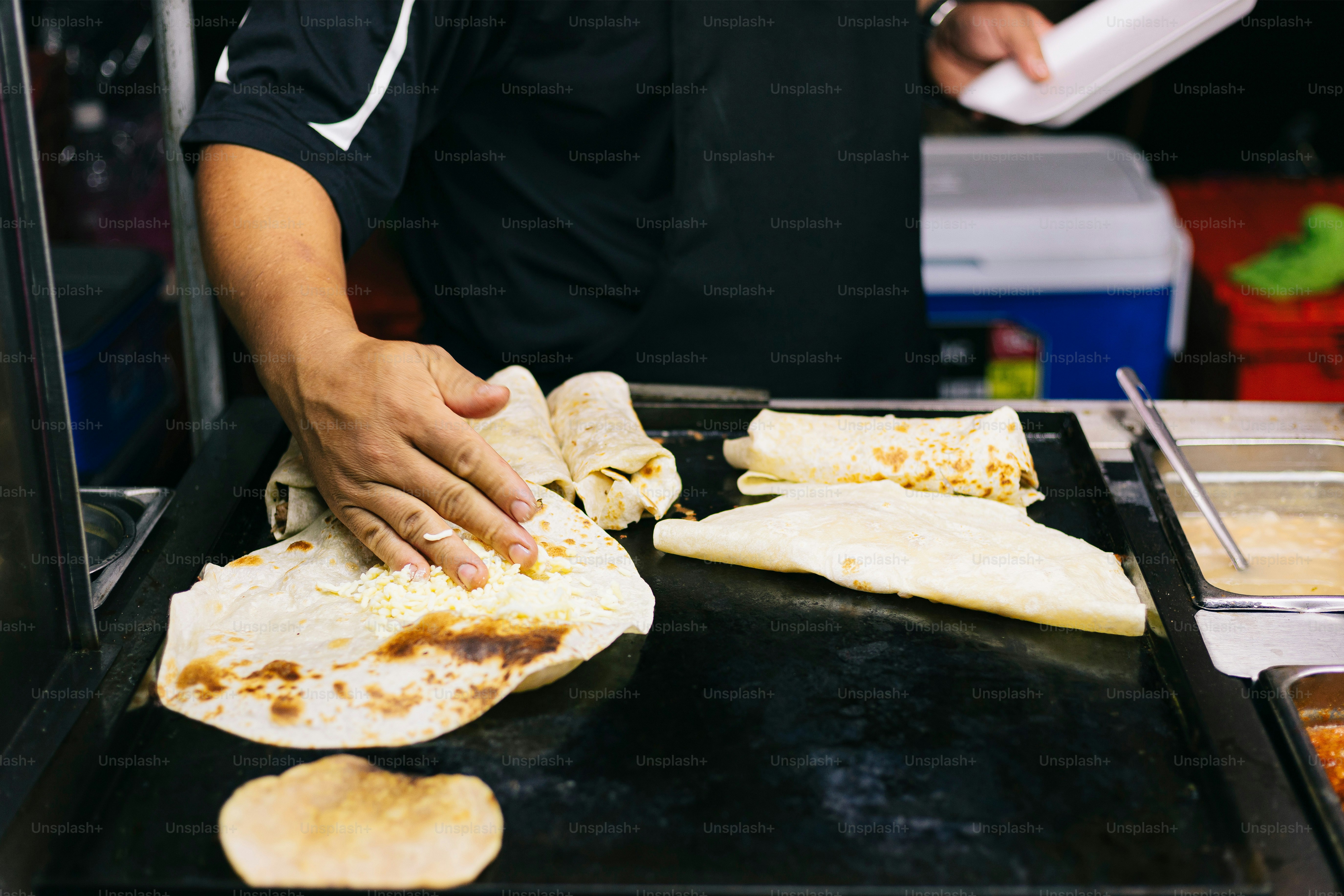 A chef is preparing food in a kitchen