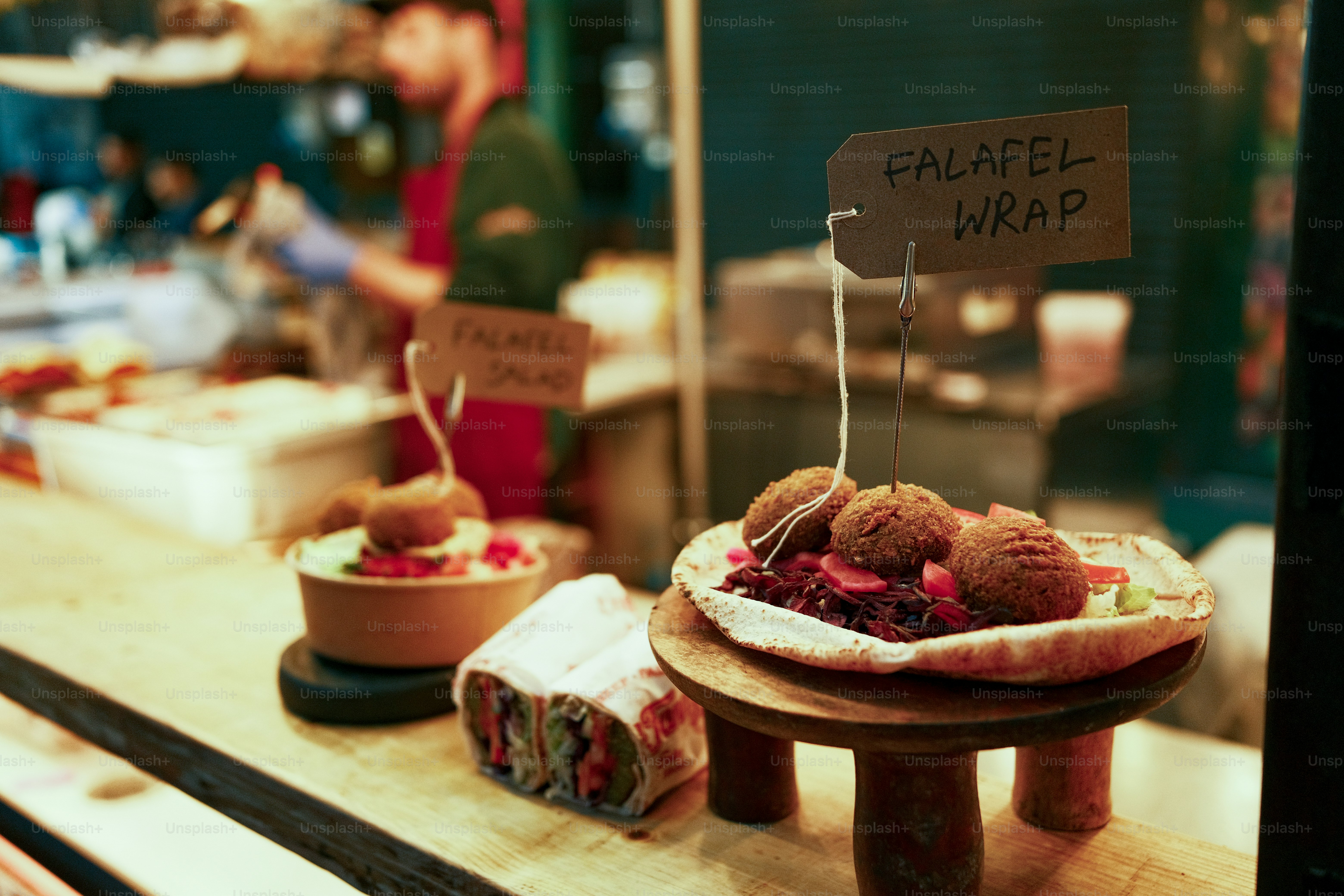 A display of pastries in a store window