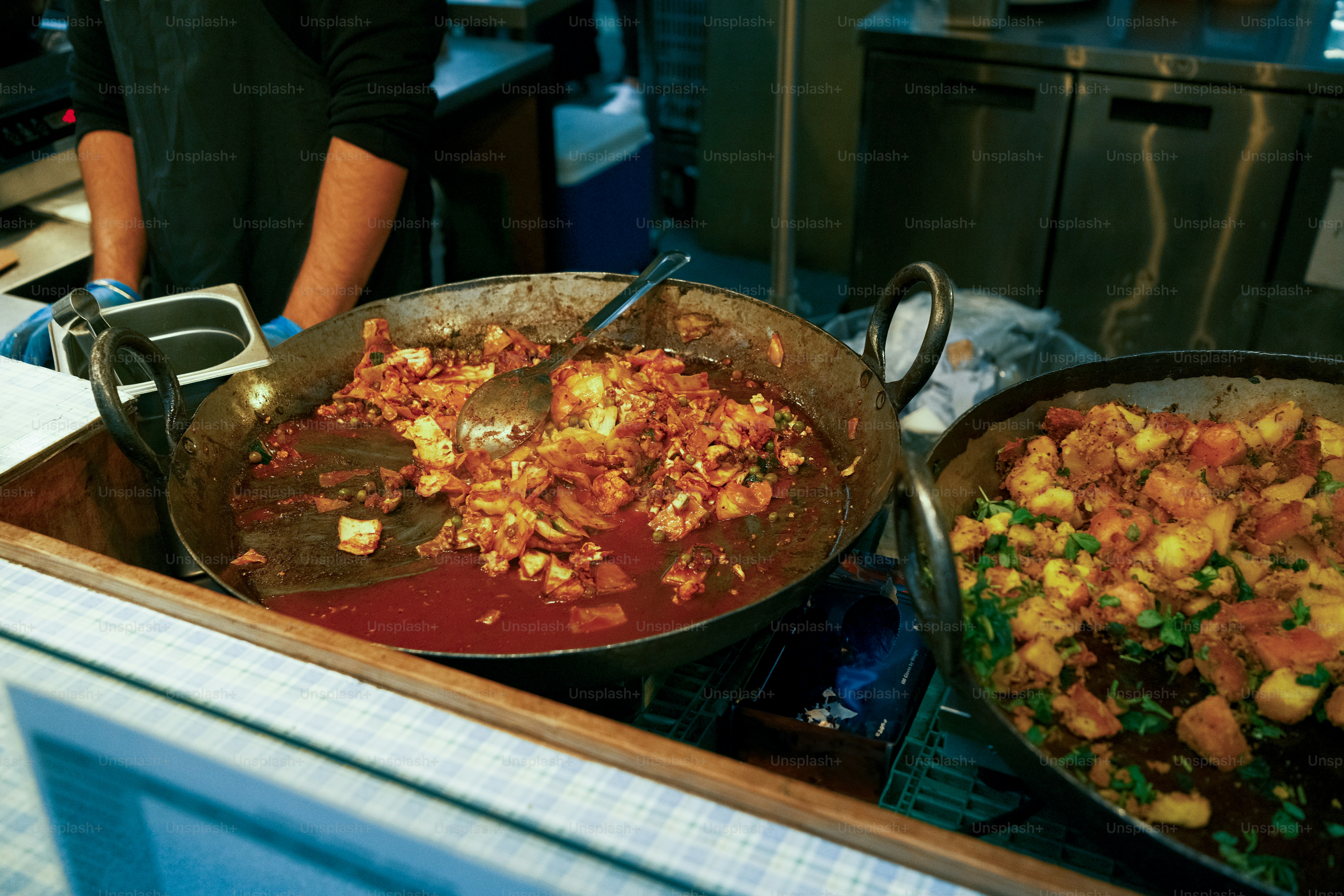 A couple of pans filled with food on top of a counter