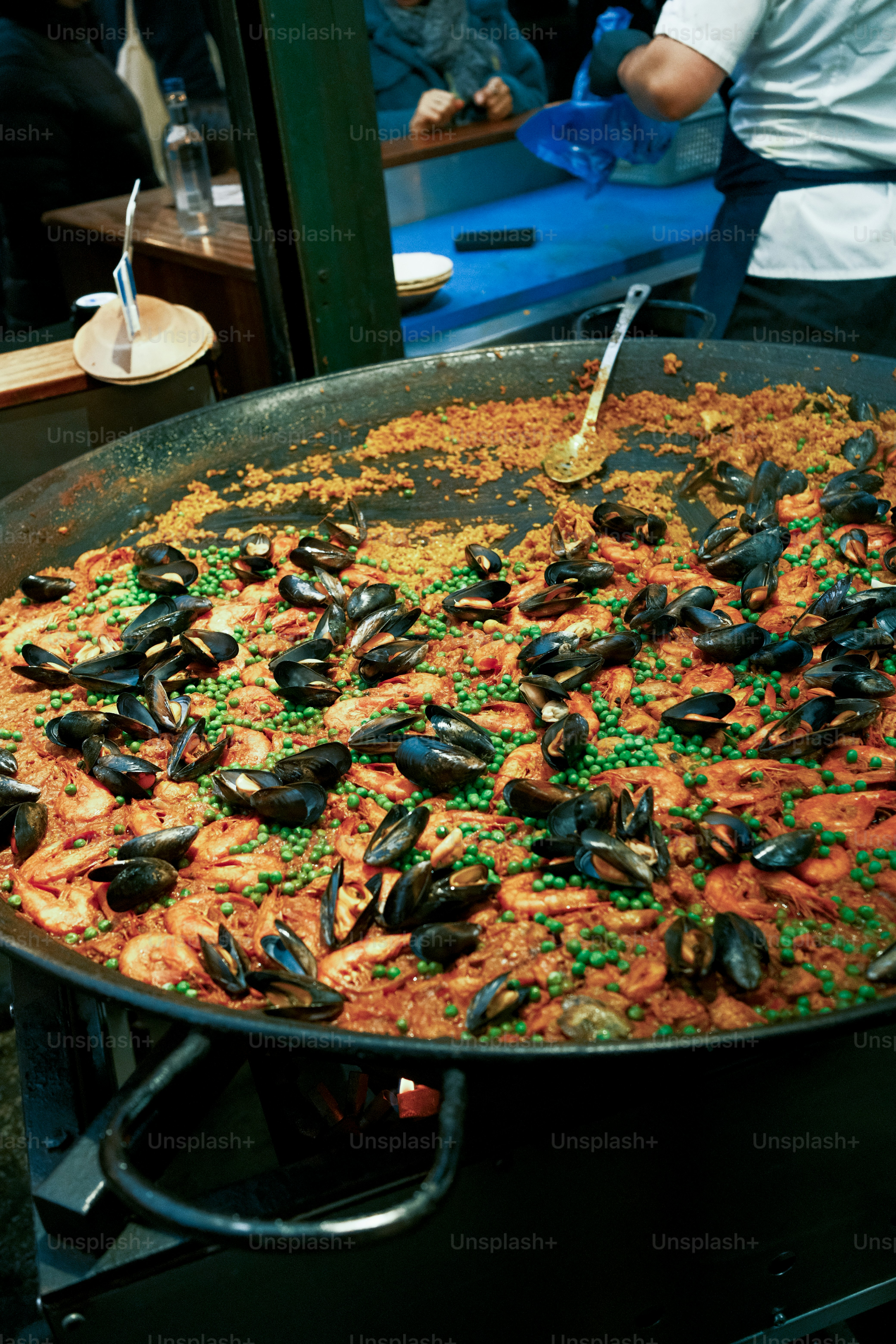 A large pan filled with lots of food on top of a table
