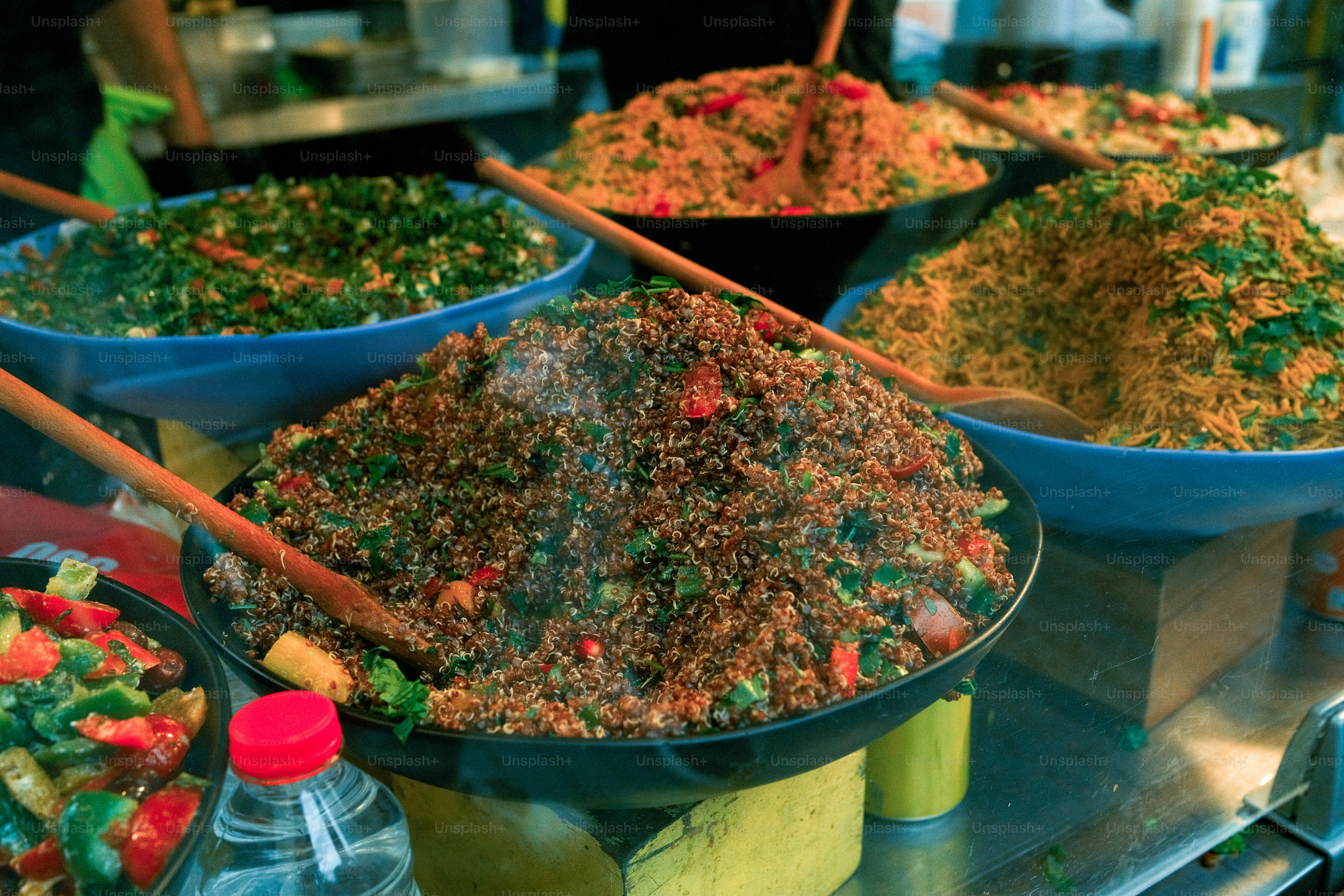 A bunch of bowls of food on a table