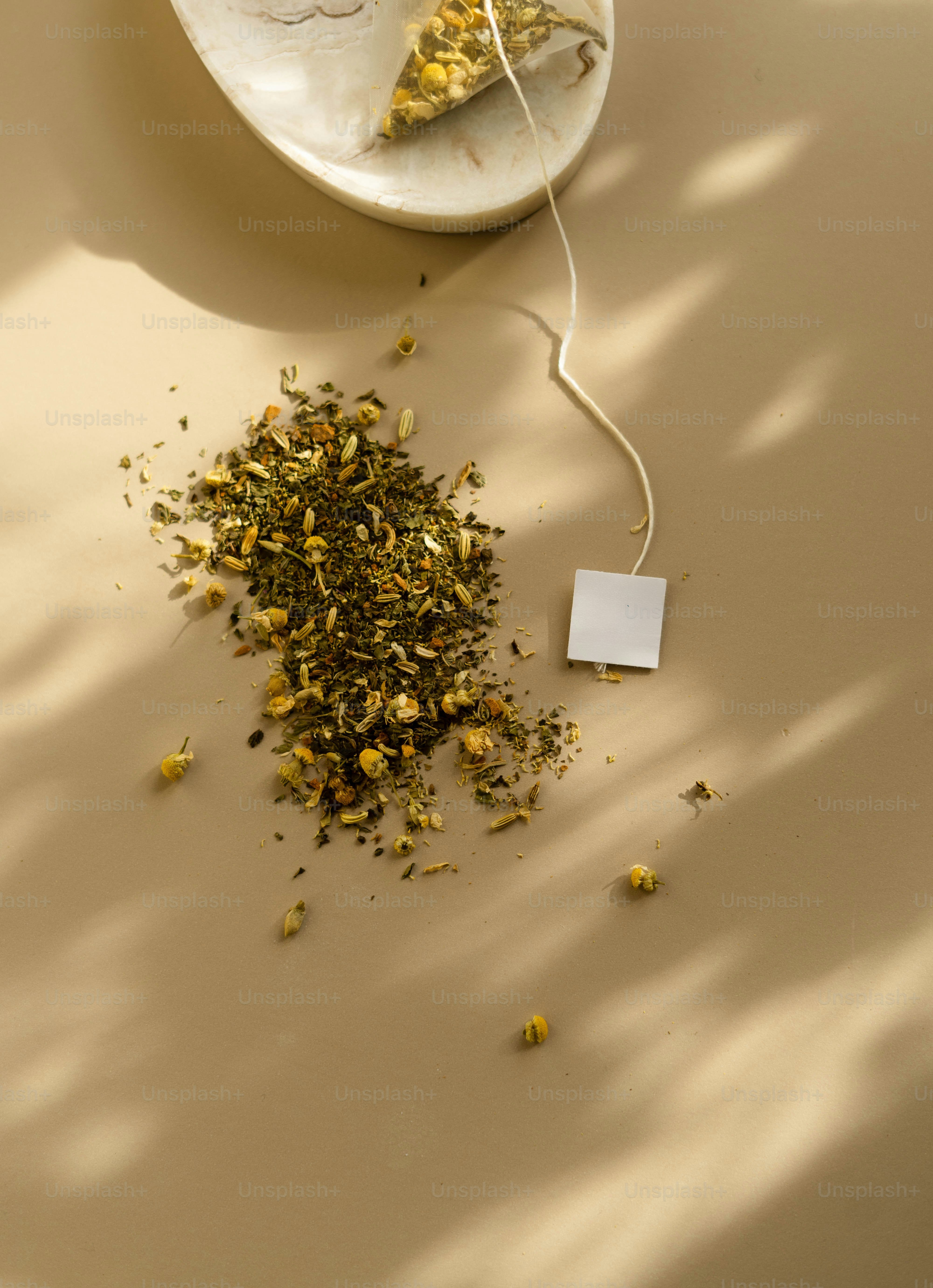 A plate with a piece of pizza next to it