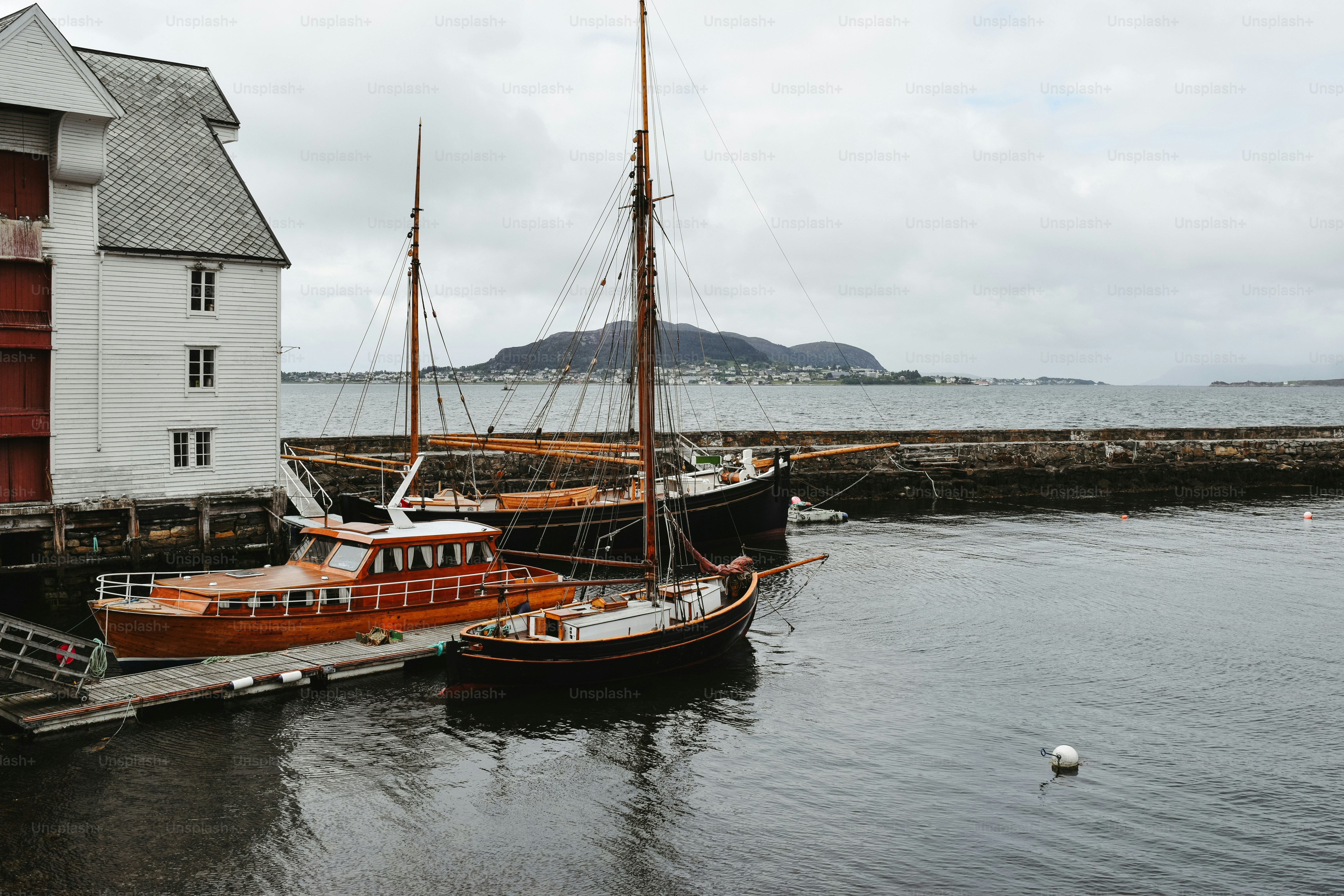 A couple of boats that are sitting in the water