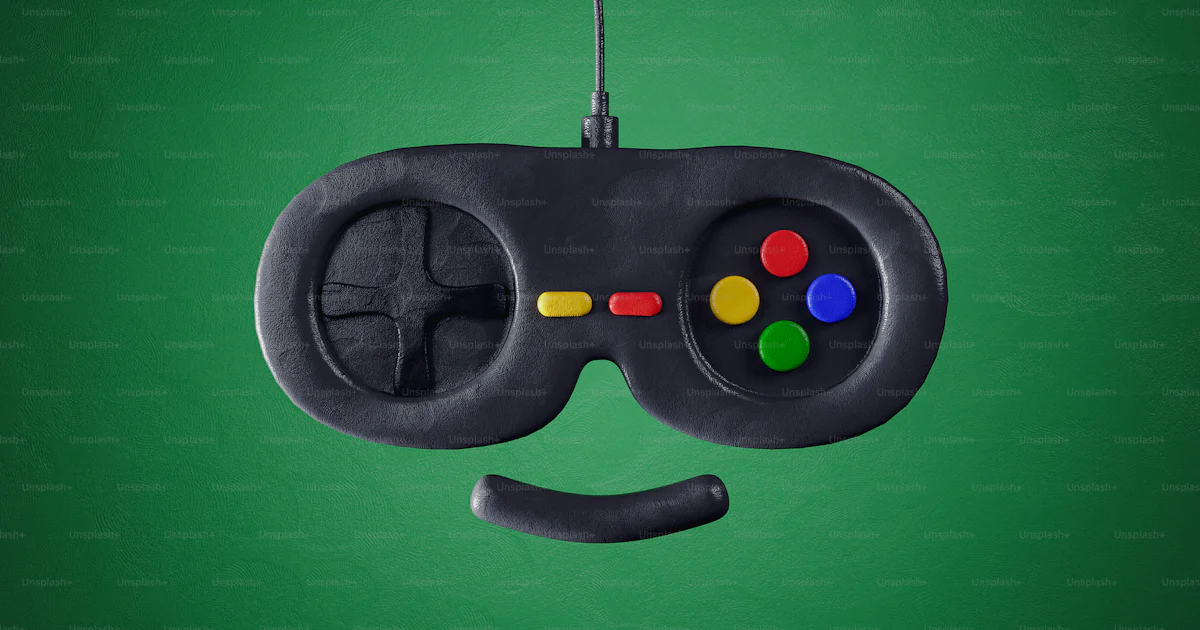 Game Controller Face A video game controller with a smiley face drawn on it photo – Gaming ...